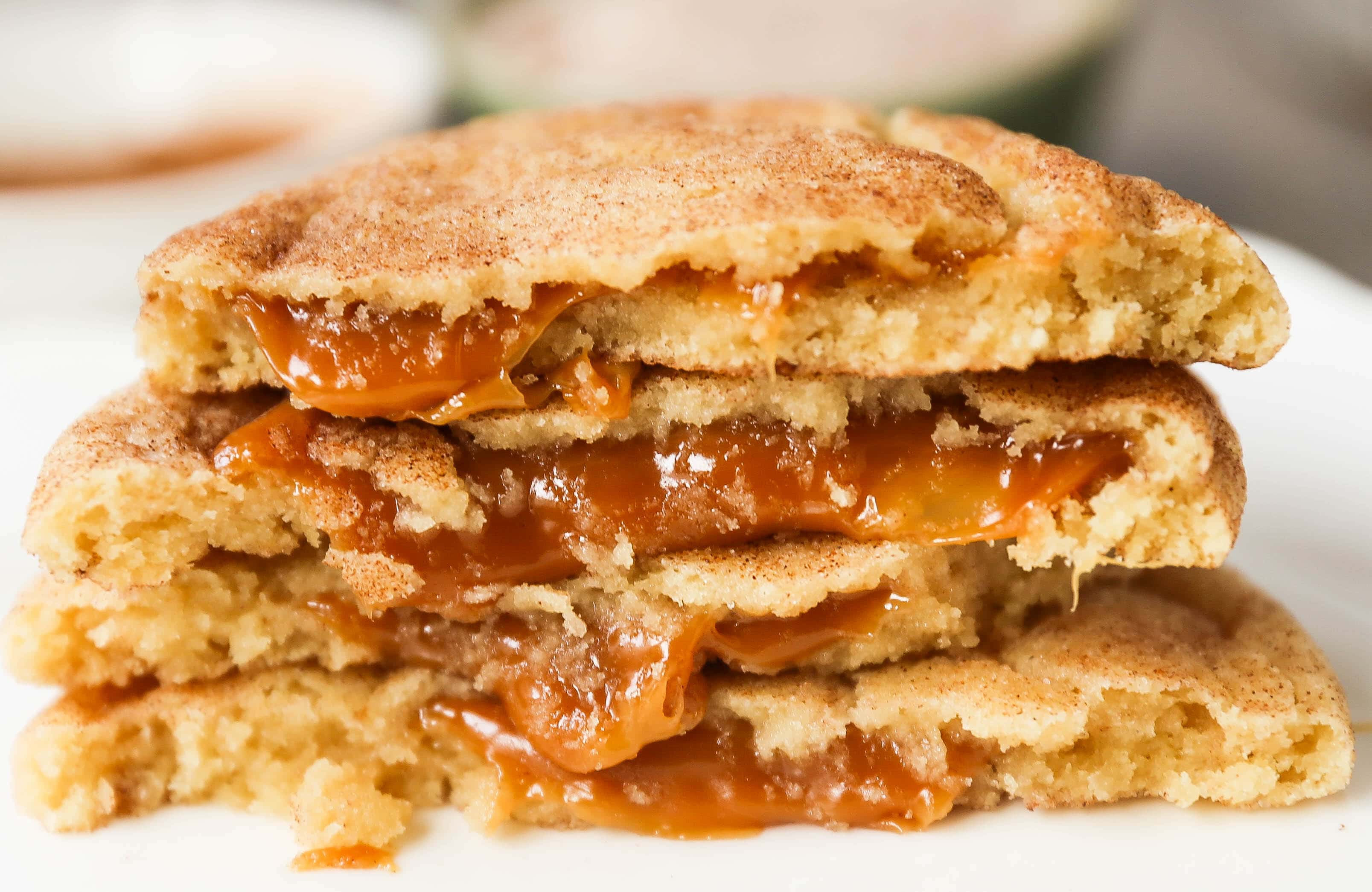 Caramel Filled Snickerdoodle Cookies Soft chewy cinnamon sugar snickerdoodle cookies stuffed with buttery caramel. The perfect caramel stuffed snickerdoodle cookie recipe! www.modernhoney.com #caramelsnickerdoodles #christmascookies #cookie #cookies