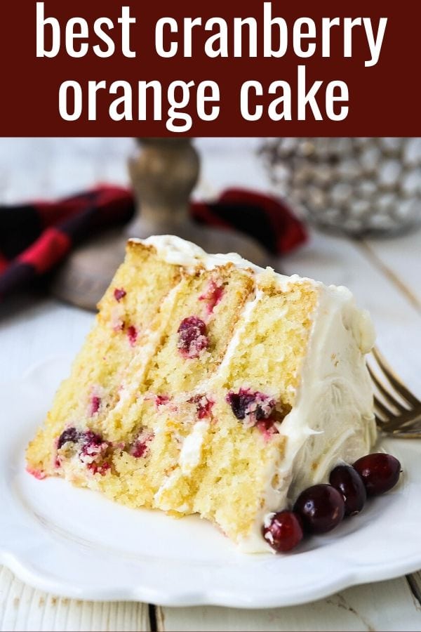 Cranberry Orange Cake. A moist orange zest cake with fresh cranberries with a sweet cream cheese orange frosting. A sweet yet tart holiday cake. www.modernhoney.com #cranberry #cranberrycake #cranberryorange #cranberryorangecake