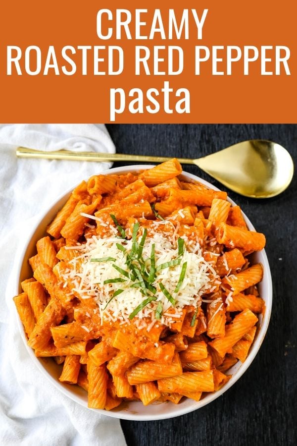 Creamy Roasted Red Pepper Pasta  A creamy roasted red pepper and tomato basil sauce with garlic and heavy cream all tossed together with pasta and topped with parmesan cheese. A flavorful robust pasta dish! www.modernhoney.com #pasta #italian #italianfood 