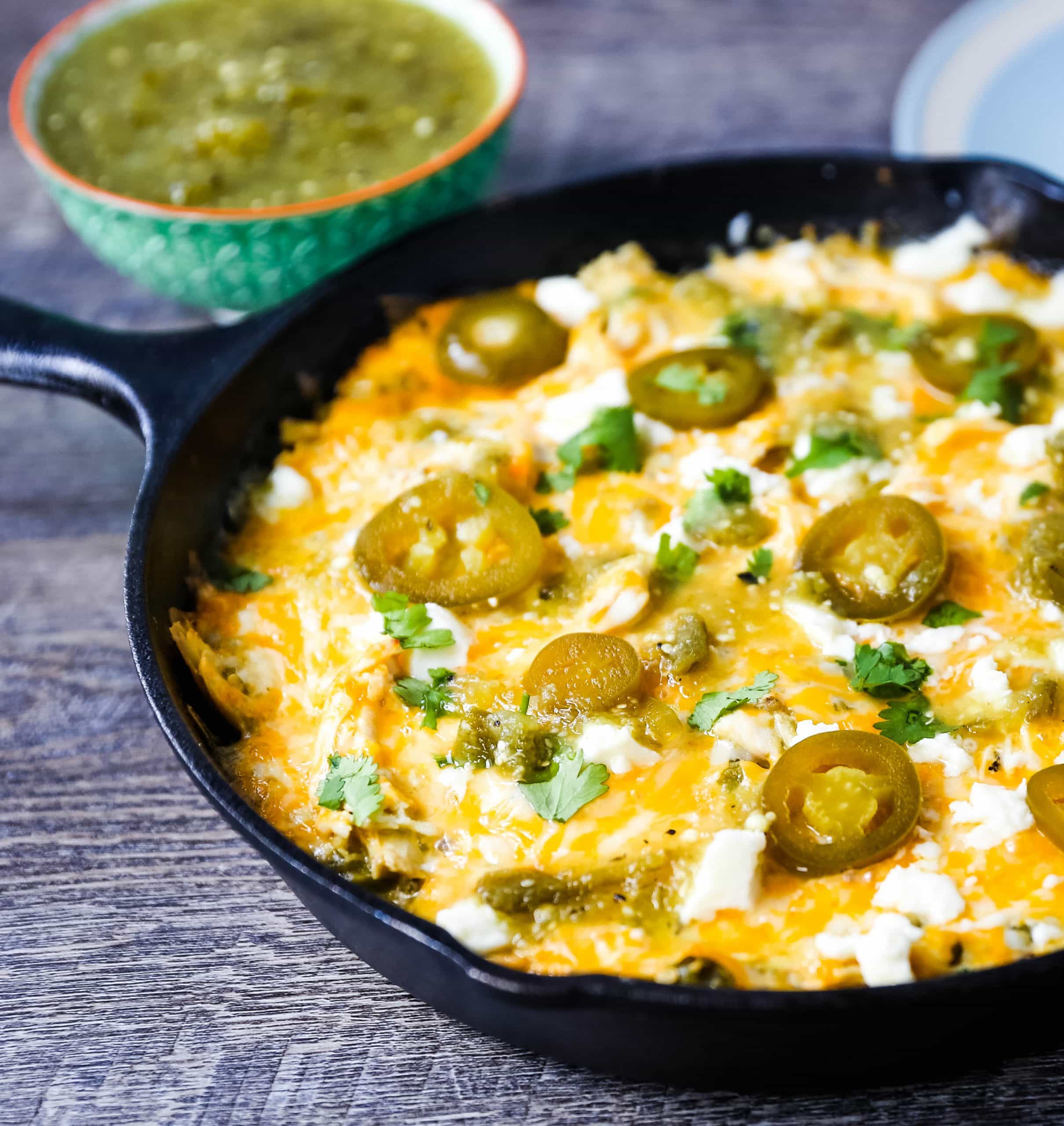 Chicken Stacked Enchiladas Quick and easy stacked chicken enchiladas with salsa verde and Mexican cheeses. Authentic Mexican chicken enchiladas that can be thrown together in a snap! The best stacked chicken enchiladas recipe. www.modernhoney.com #enchiladas #mexicanfood #chicken #chickenenchiladas
