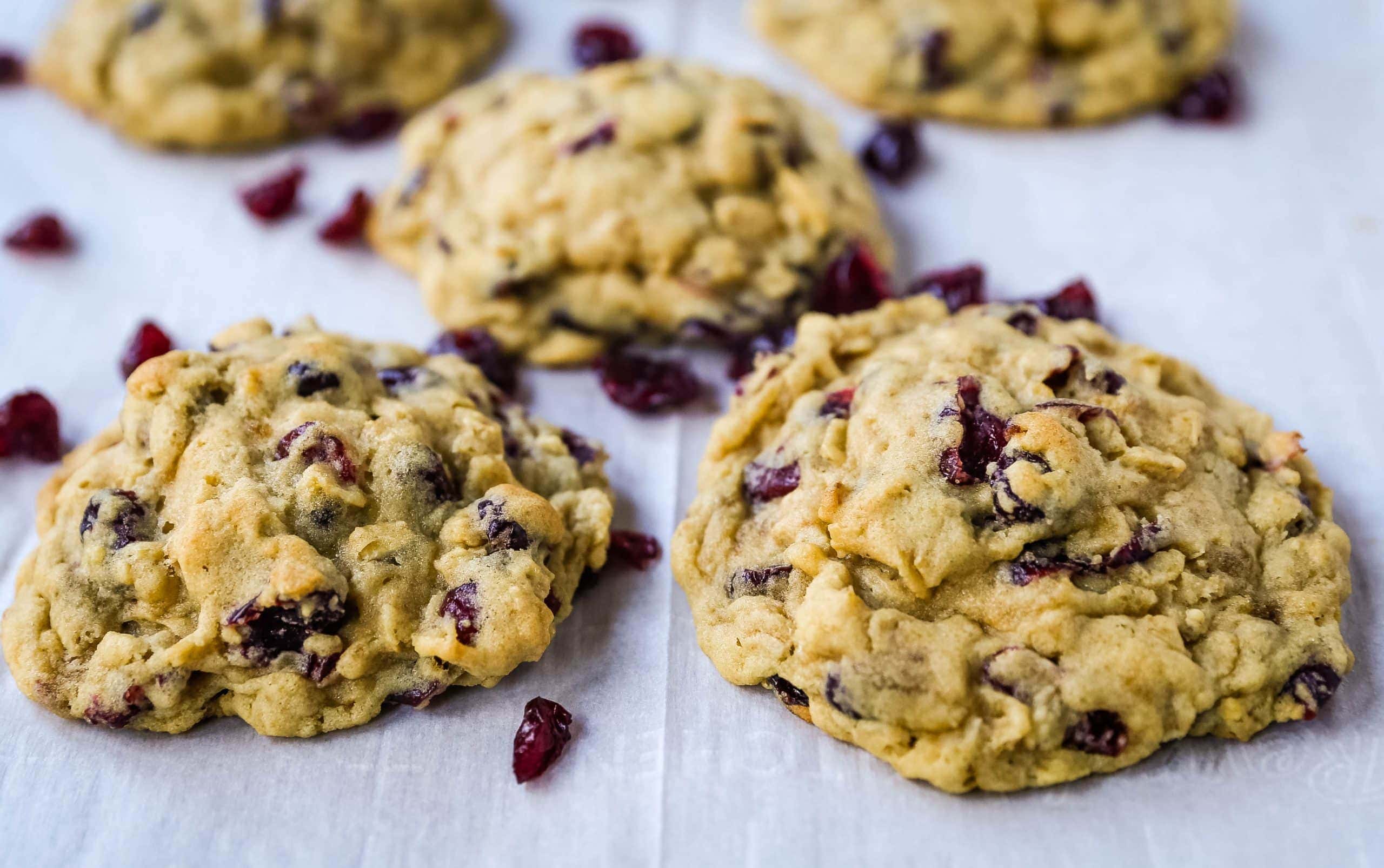 Cranberry Oatmeal Cookies Soft chewy brown sugar oatmeal cookies with sweetened dried cranberries. A chewy and hearty oatmeal cookie that everyone will love! www.modernhoney.com #oatmealcookie #oatmealcookies #cranberryoatmeal #cookie #cookies