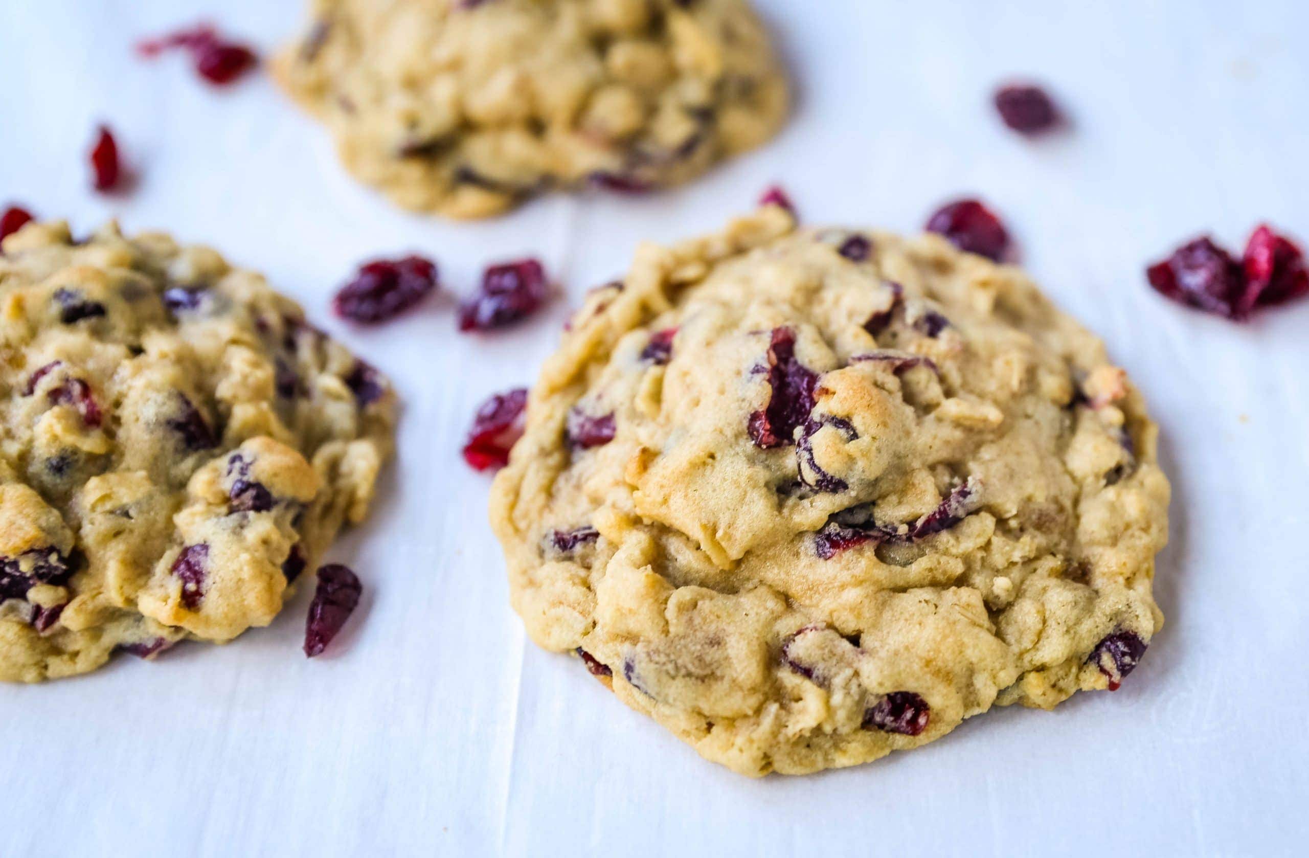 Cranberry Oatmeal Cookies Soft chewy brown sugar oatmeal cookies with sweetened dried cranberries. A chewy and hearty oatmeal cookie that everyone will love! www.modernhoney.com #oatmealcookie #oatmealcookies #cranberryoatmeal #cookie #cookies