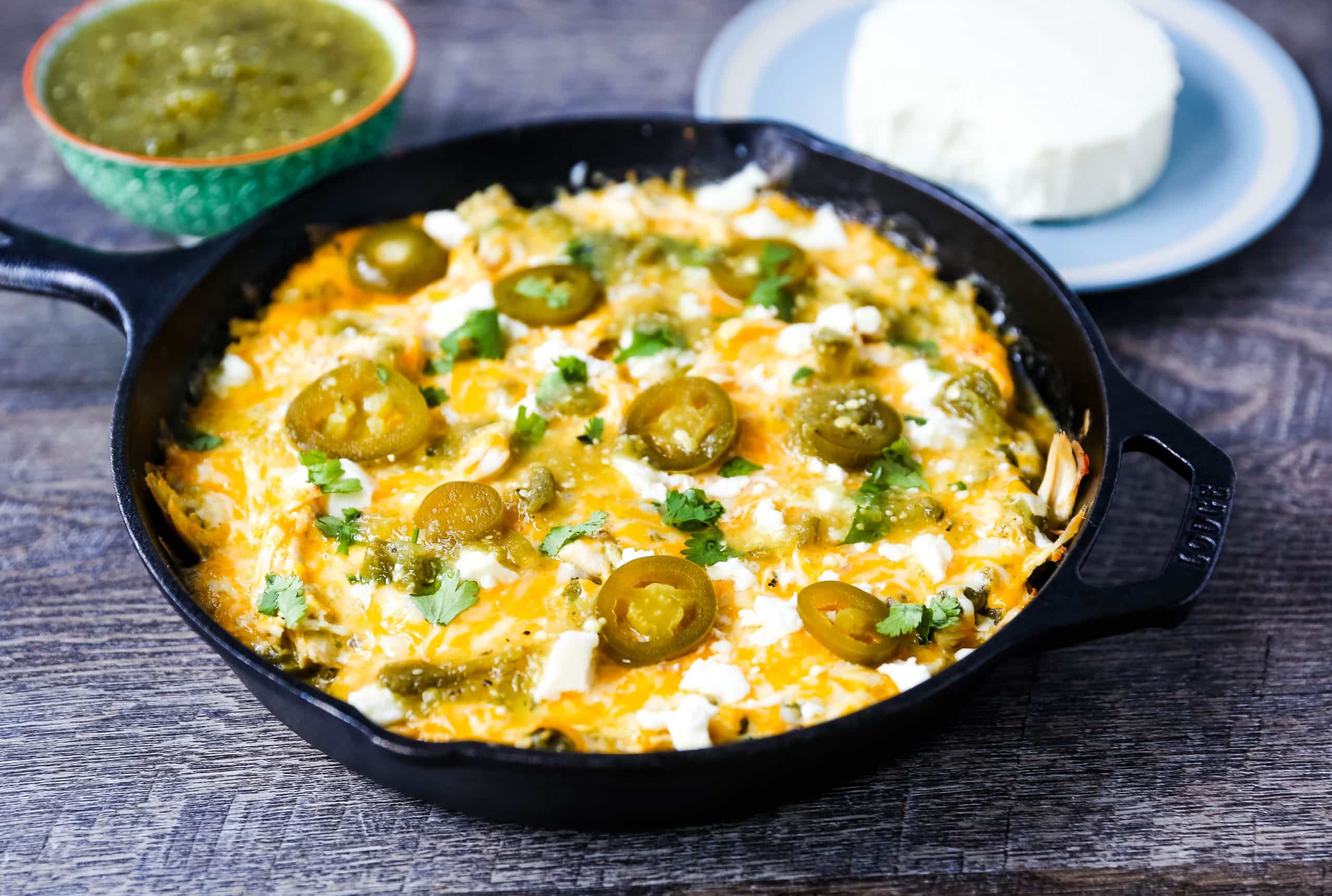 Chicken Stacked Enchiladas Quick and easy stacked chicken enchiladas with salsa verde and Mexican cheeses. Authentic Mexican chicken enchiladas that can be thrown together in a snap! The best stacked chicken enchiladas recipe. www.modernhoney.com #enchiladas #mexicanfood #chicken #chickenenchiladas