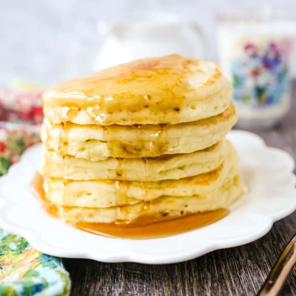 The Best Pancake Recipe. Light and fluffy buttermilk pancakes with a secret ingredient to make it extra tender. This is the only pancake recipe you will ever need! www.modernhoney.com #pancakes #pancake #breakfast #brunch