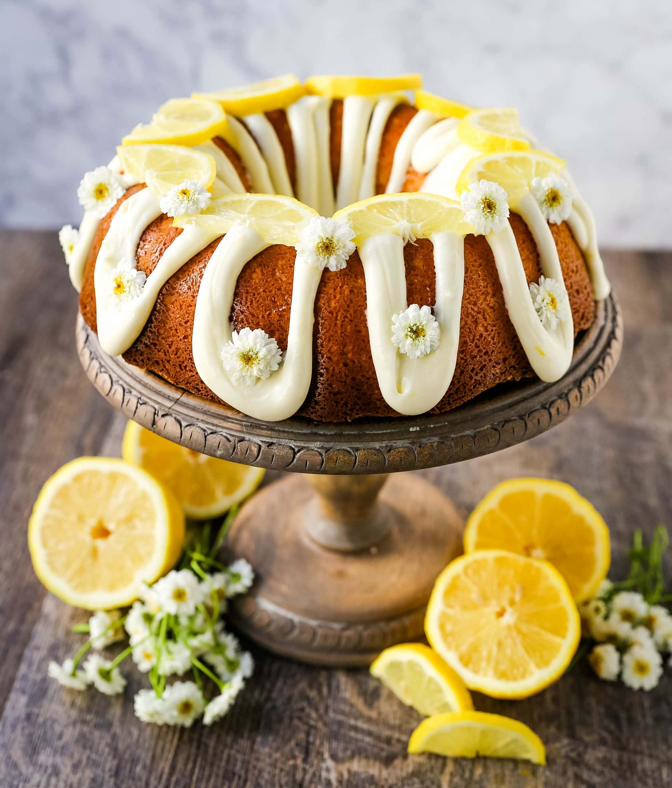 Lemon Bundt Cake. Moist, flavorful lemon bundt cake with a fresh cream cheese lemon glaze. Tips and tricks for making the perfect lemon bundt cake. www.modernhoney.com #lemoncake #lemonbundtcake #bundtcake #cake
