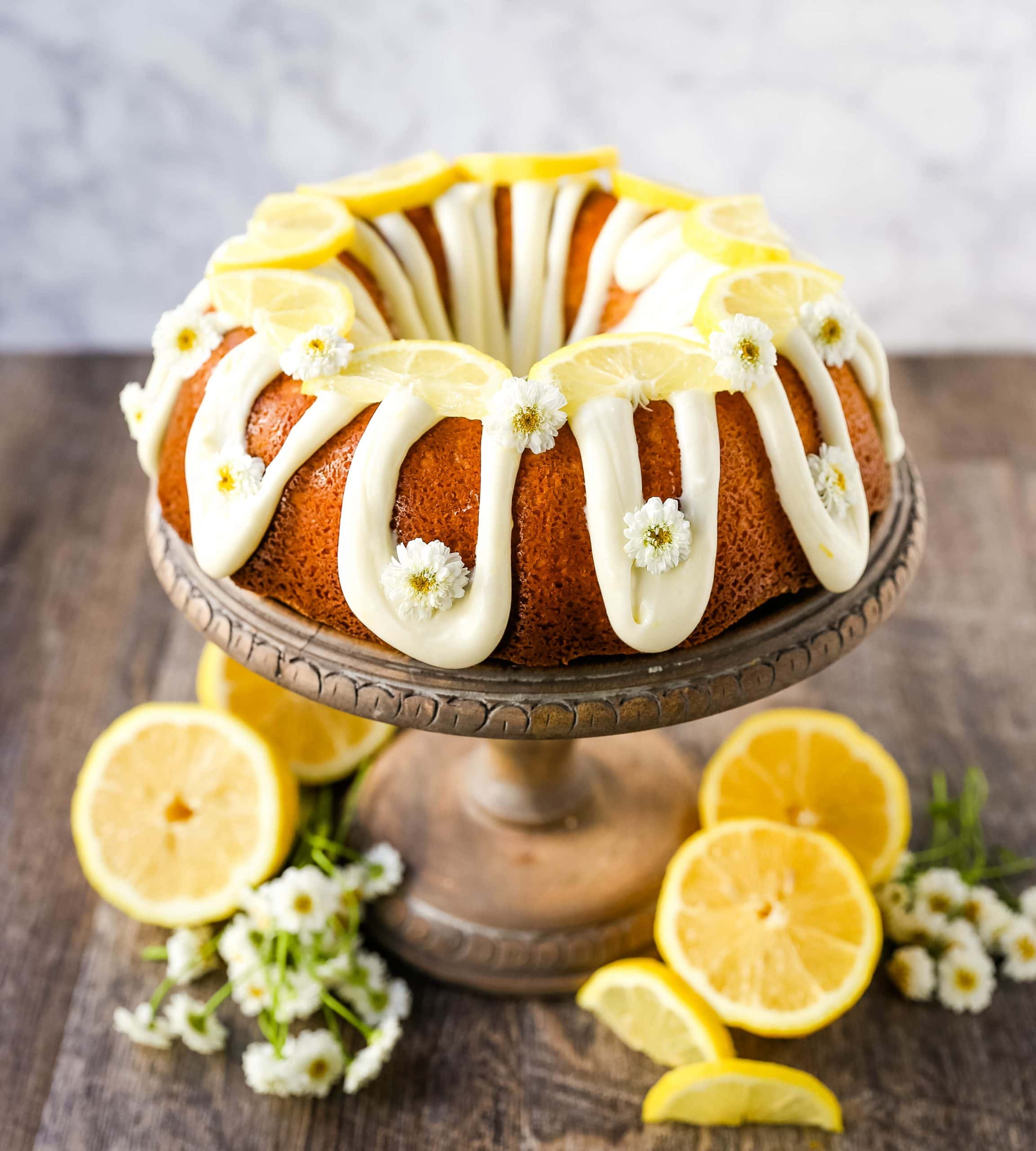 Lemon Bundt Cake. Moist, flavorful lemon bundt cake with a fresh cream cheese lemon glaze. Tips and tricks for making the perfect lemon bundt cake. www.modernhoney.com #lemoncake #lemonbundtcake #bundtcake #cake