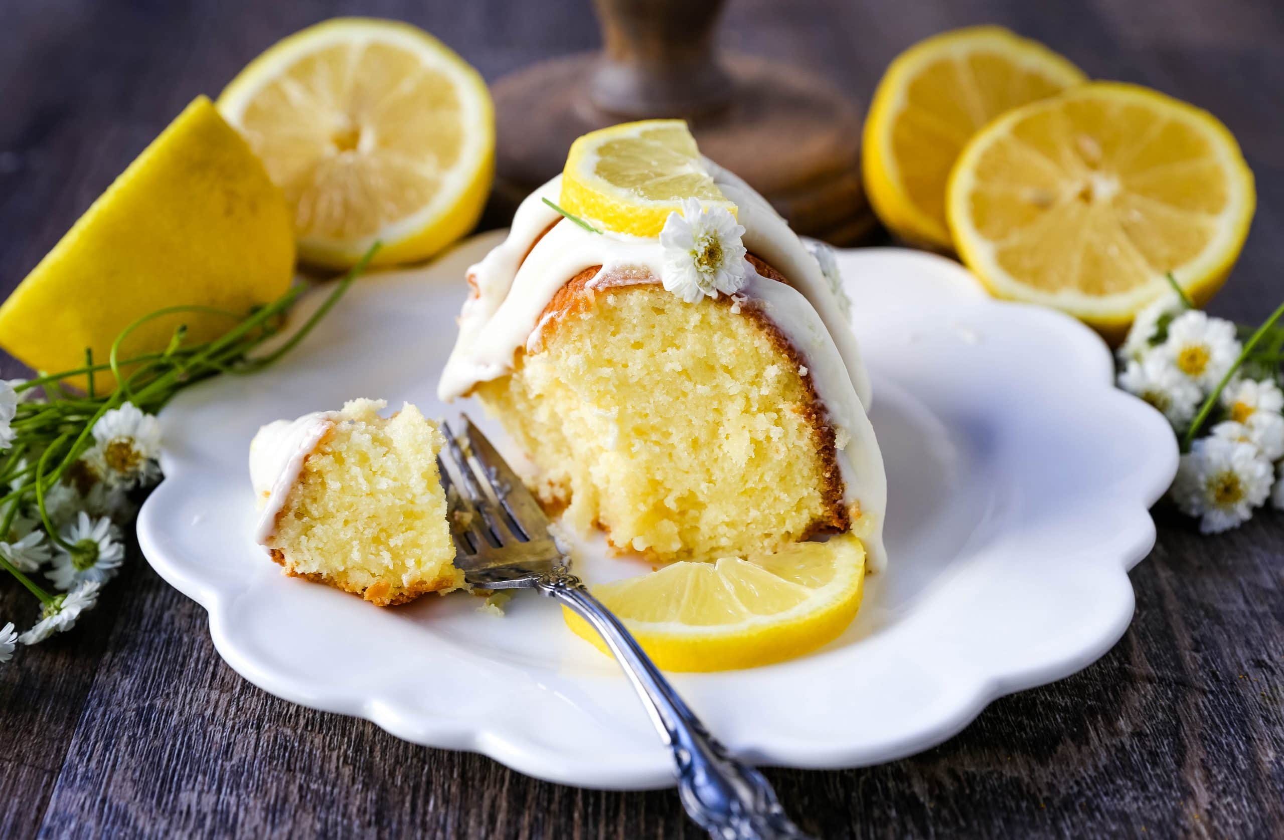 Lemon Bundt Cake. Moist, flavorful lemon bundt cake with a fresh cream cheese lemon glaze. Tips and tricks for making the perfect lemon bundt cake. www.modernhoney.com #lemoncake #lemonbundtcake #bundtcake #cake