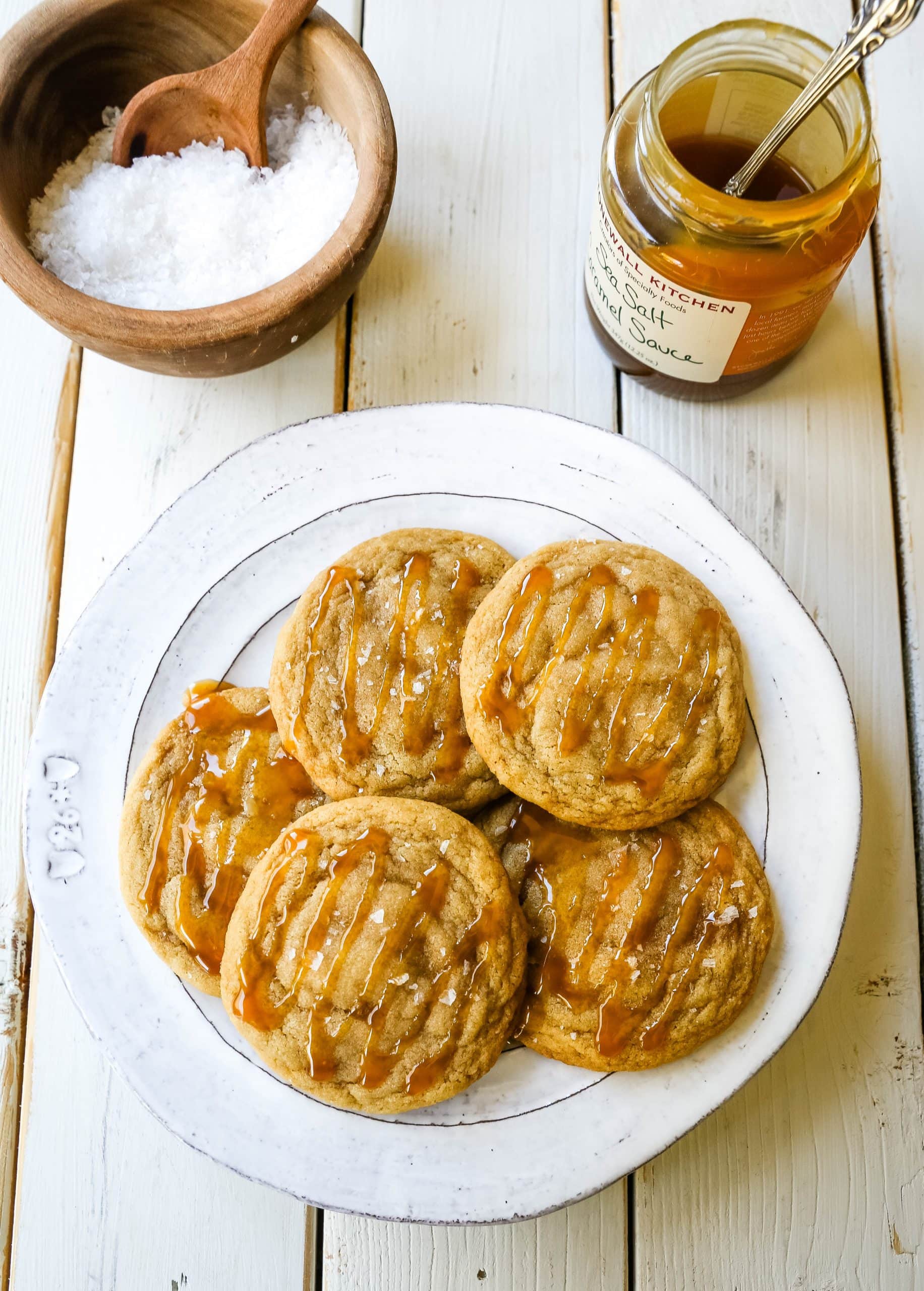 Salted Caramel Cookies Soft chewy caramel cookies with sea salt and drizzled with salted caramel. www.modernhoney.com #cookie #cookies #caramel #caramelcookie #saltedcaramel #seasaltcaramel