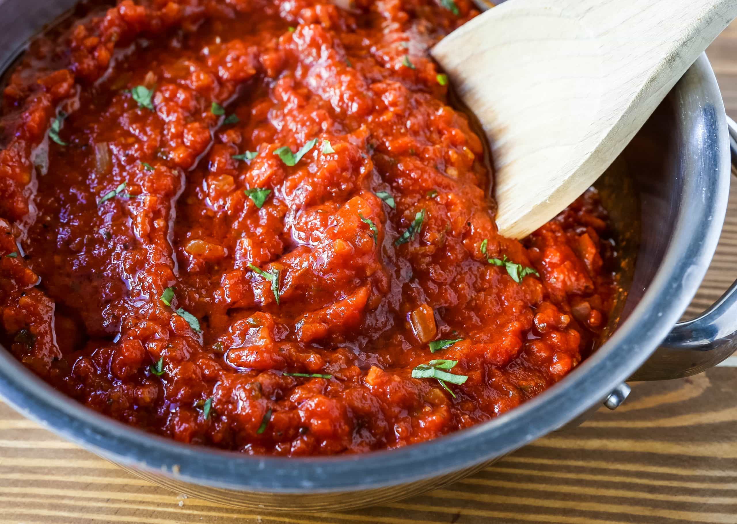 Classic Italian Tomato Sauce A robust tomato sauce made with olive oil, onion, sweet carrot, garlic, canned San Marzano tomatoes, fresh basil, tomato paste, oregano, and red pepper flakes. A flavorful, homemade tomato sauce to pair perfectly with any type of pasta. www.modernhoney.com #tomatosauce #marinara #marinarasauce #italian #italianfood