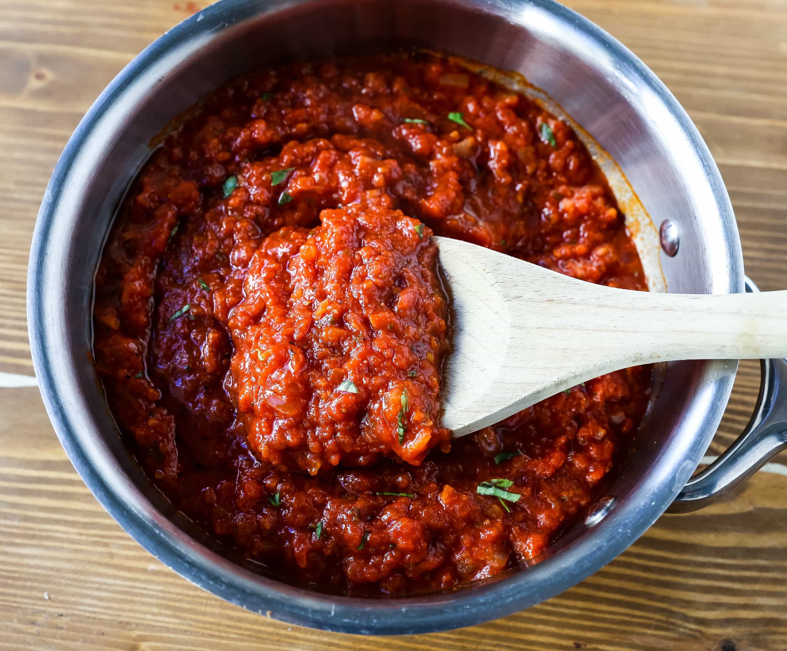 Classic Italian Tomato Sauce A robust tomato sauce made with olive oil, onion, sweet carrot, garlic, canned San Marzano tomatoes, fresh basil, tomato paste, oregano, and red pepper flakes. A flavorful, homemade tomato sauce to pair perfectly with any type of pasta. www.modernhoney.com #tomatosauce #marinara #marinarasauce #italian #italianfood