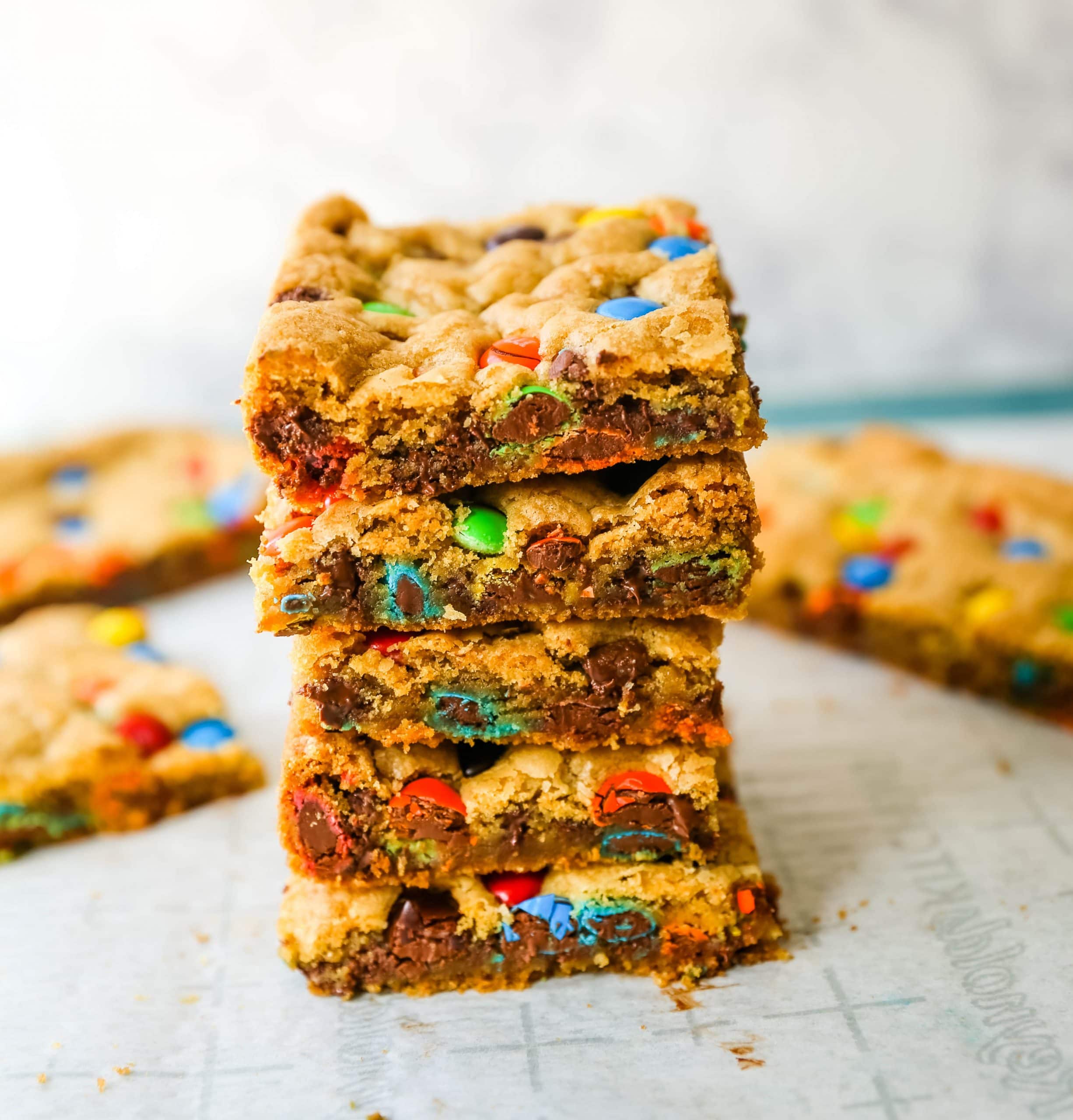 M & M Cookie Bars Soft chewy brown sugar M & M blondie cookie bars. The best M & M Cookie Bars recipe! www.modernhoney.com #bars #dessertbars #chocolatechipcookiebars