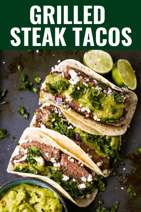 Grilled Steak Tacos. Juicy marinated grilled steak tacos with fresh cilantro, avocado, and salsa. The most flavorful and tender steak tacos recipe! www.modernhoney.com #tacos #steaktacos #steak #beeftacos