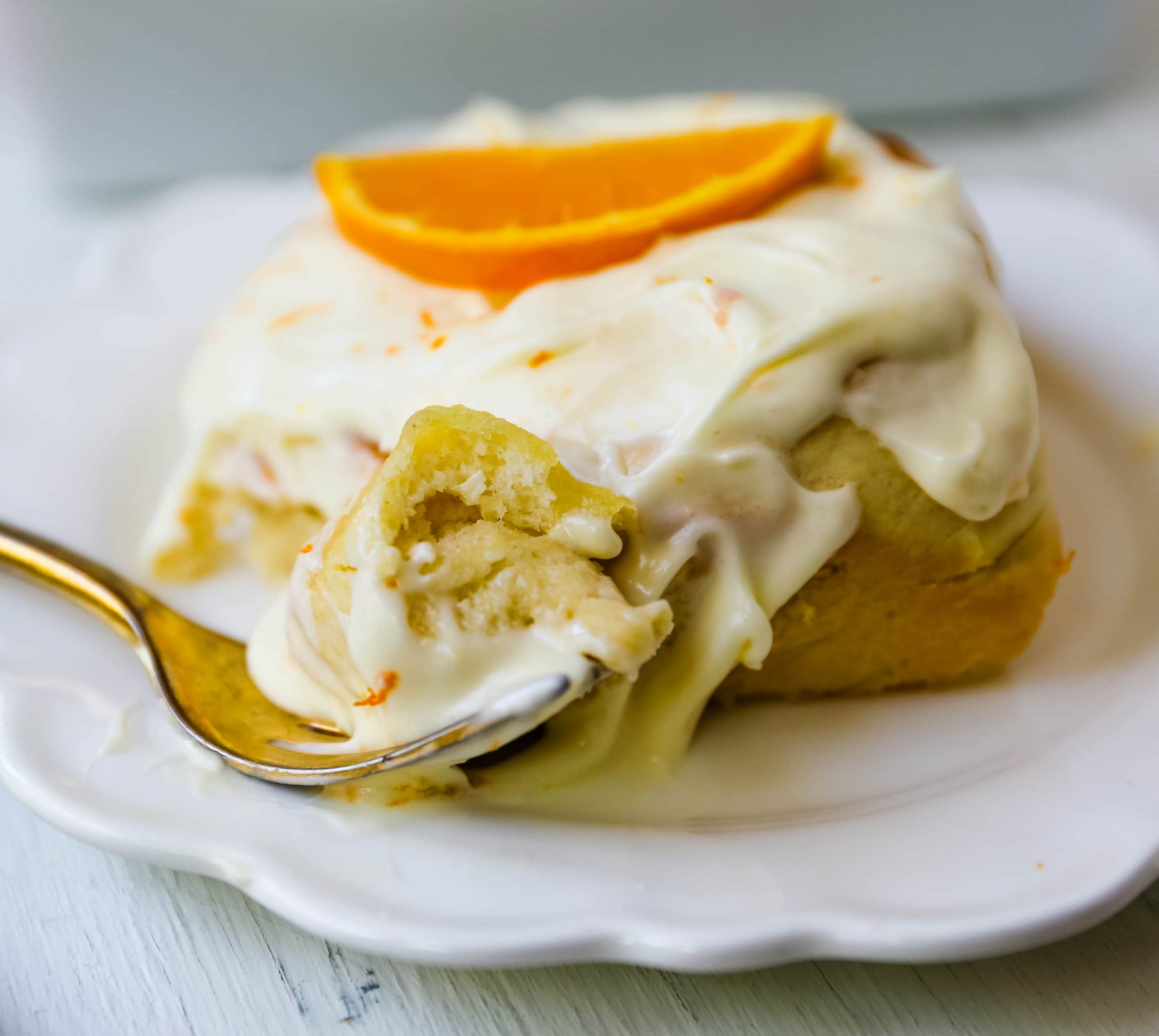 Homemade Orange Rolls Sweet homemade orange rolls with fresh orange zest and topped with an orange cream cheese frosting.  www.modernhoney.com #orangerolls #orangerolls #homemadeorangerolls #baking