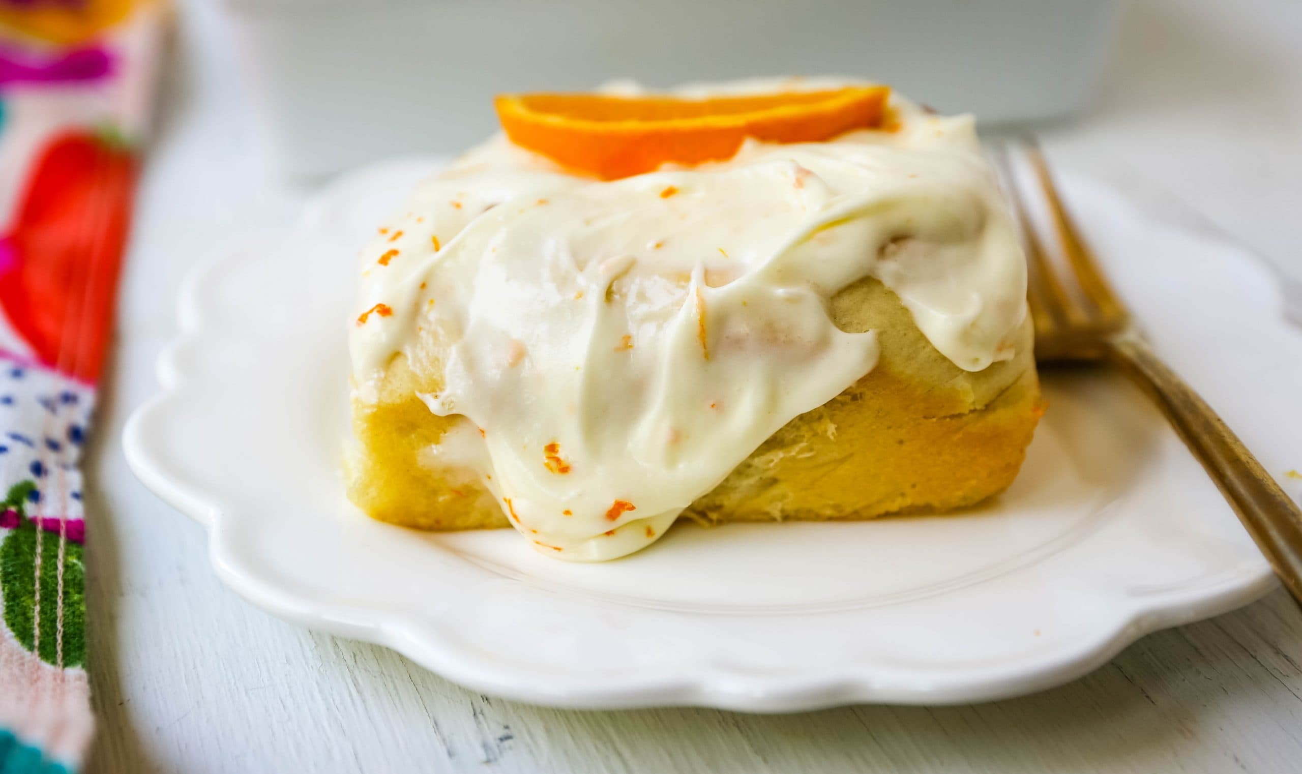 Homemade Orange Rolls Sweet homemade orange rolls with fresh orange zest and topped with an orange cream cheese frosting.  www.modernhoney.com #orangerolls #orangerolls #homemadeorangerolls #baking