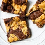 Brookies (Chocolate Chip Cookie and Brownie Bars) A homemade decadent chocolate brownie and chocolate chip cookie all in one! A brownie and chocolate chip cookie just got married. The best dessert bar! www.modernhoney.com #brookie #brookies #brownies #dessertbar