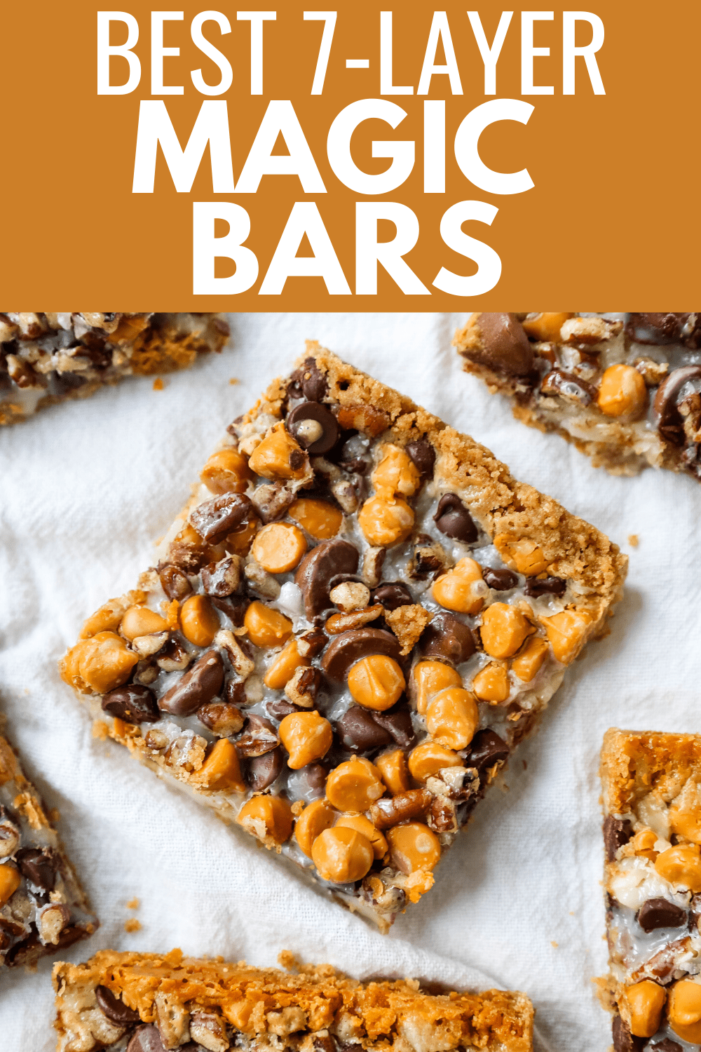 7-Layer Magic Bars. The famous dessert bars made with a graham cracker crust, sweetened flaked coconut, chocolate chips, butterscotch chips, nuts, all drizzled with sweetened condensed milk. The perfect dessert bar recipe! www.modernhoney.com #7layerbars #magicbars #magiccookiebars #sevenlayerbars