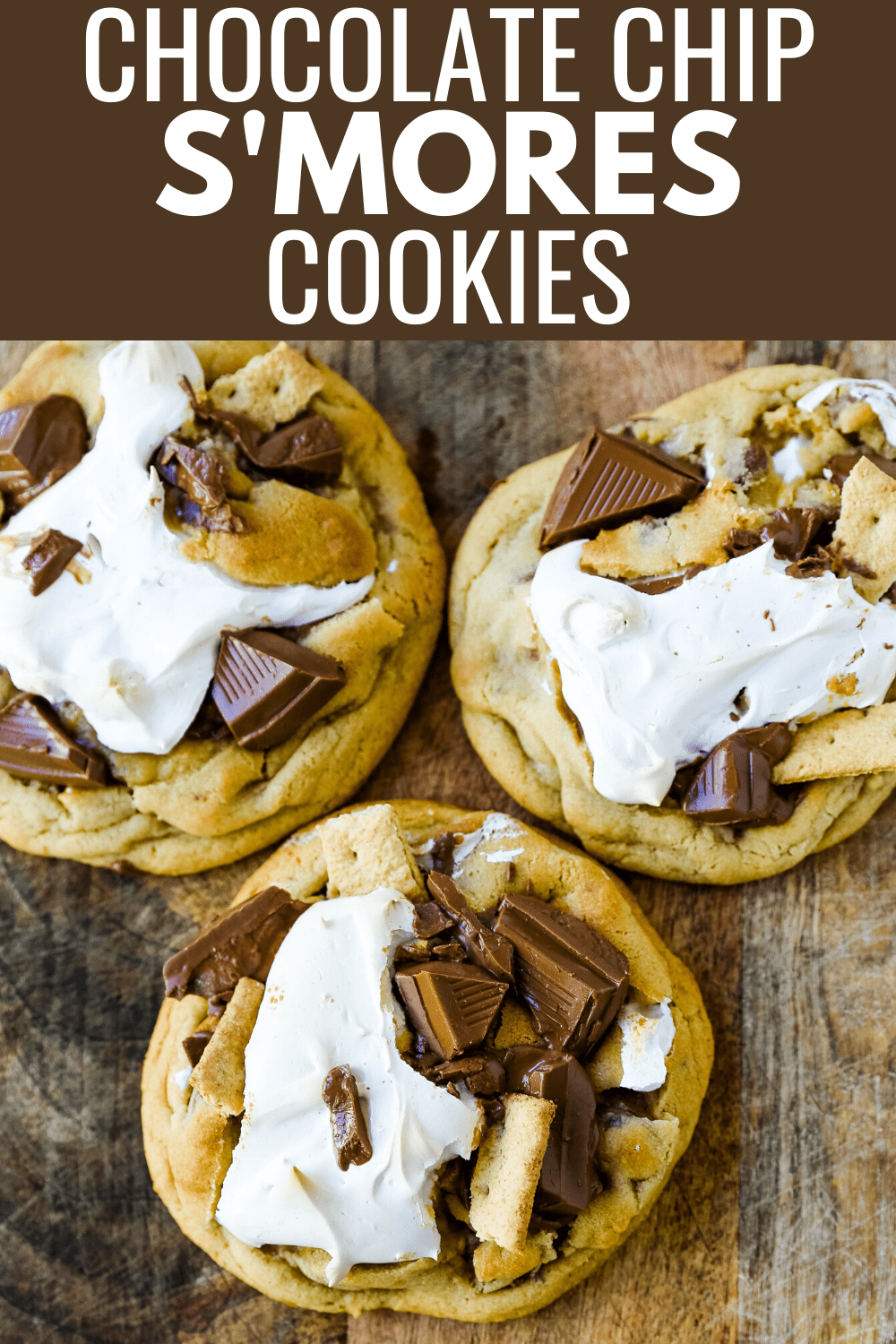 Chocolate Chip S'mores Cookies Warm milk chocolate chip cookies with creamy marshmallow fluff and graham cracker. The most perfect s'mores and chocolate chip cookie in one! www.modernhoney.com #cookies #smores #smorescookies #chocolatechipcookies