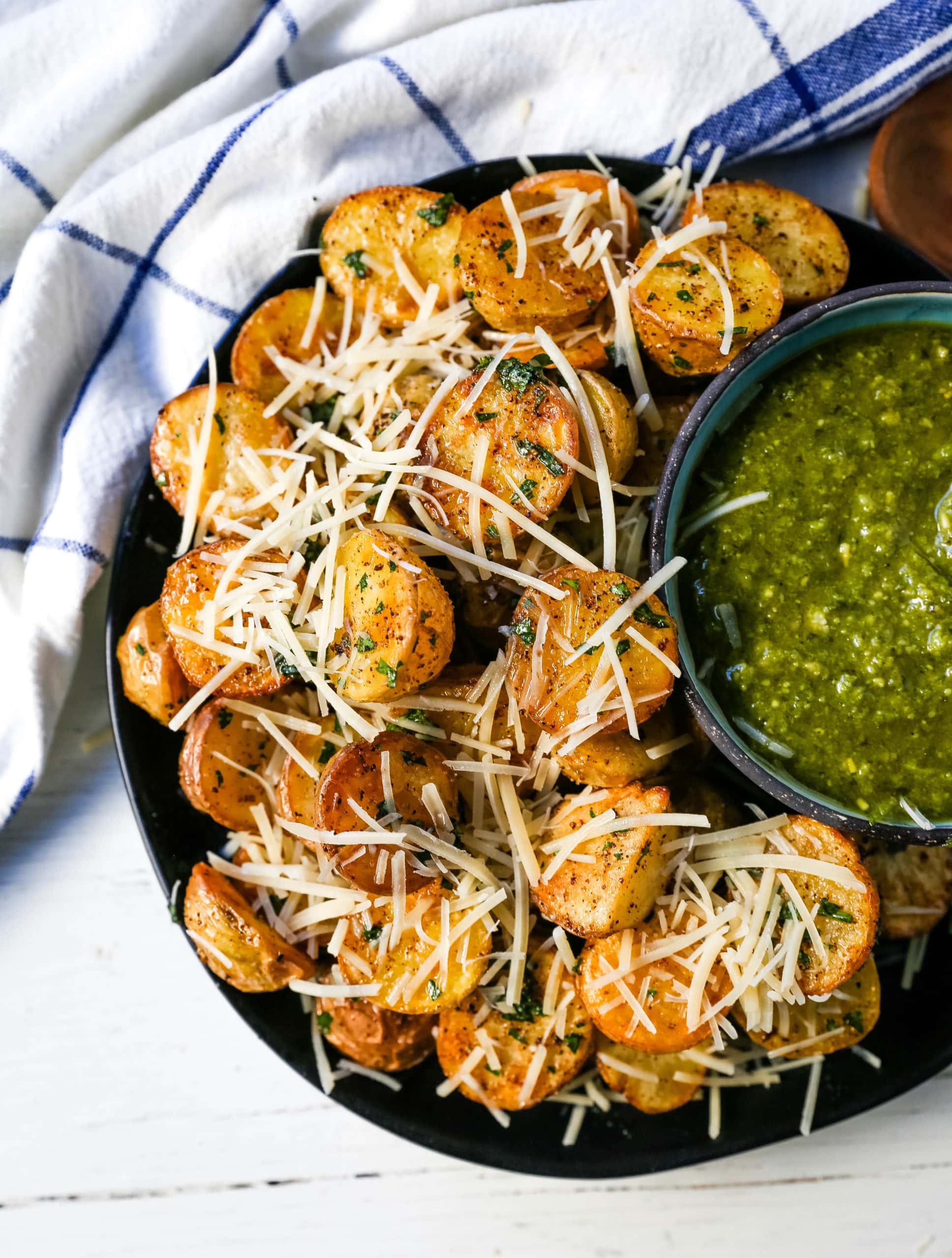 Oven Roasted Potatoes Garlic Roasted Roasted Potatoes with buttery Yukon gold potatoes baked with olive oil, garlic butter, and sprinkled with fresh parsley. The Best Roasted Potatoes recipe! www.modernhoney.com #potatoes #roastedpotatoes #sidedish