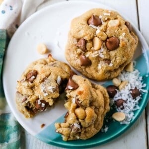 Milk Chocolate Chip Macadamia Nut Coconut Cookies Thick soft and chewy bakery-style milk chocolate chip macadamia nut coconut cookies are an Island favorite!  www.modernhoney.com #cookies #chocolatechipmacadamianut