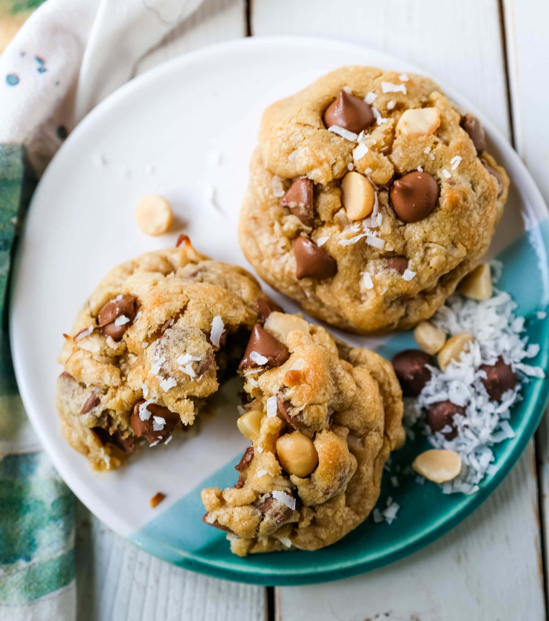 Milk Chocolate Chip Macadamia Nut Coconut Cookies Thick soft and chewy bakery-style milk chocolate chip macadamia nut coconut cookies are an Island favorite!  www.modernhoney.com #cookies #chocolatechipmacadamianut 