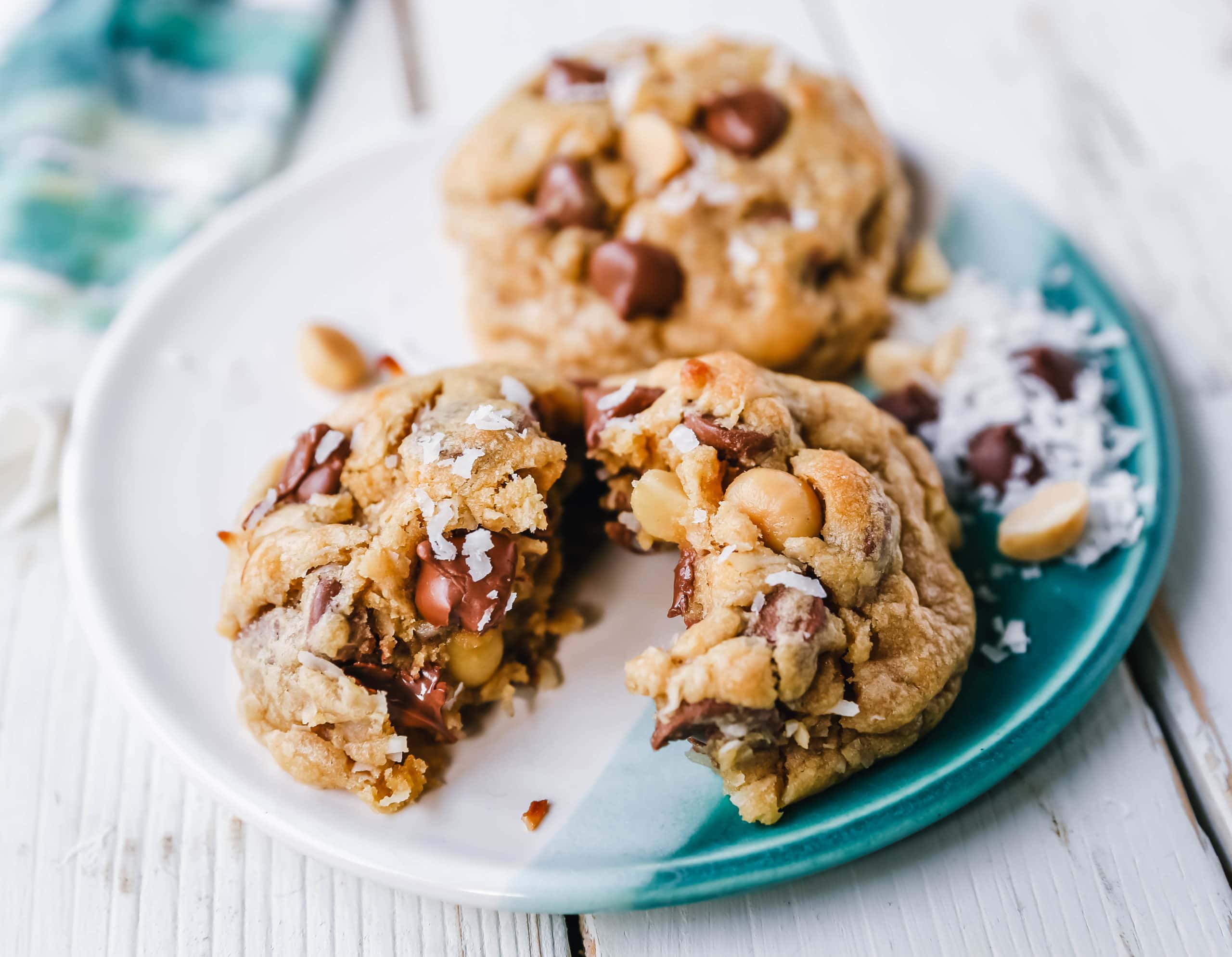 Milk Chocolate Chip Macadamia Nut Coconut Cookies Thick soft and chewy bakery-style milk chocolate chip macadamia nut coconut cookies are an Island favorite!  www.modernhoney.com #cookies #chocolatechipmacadamianut 