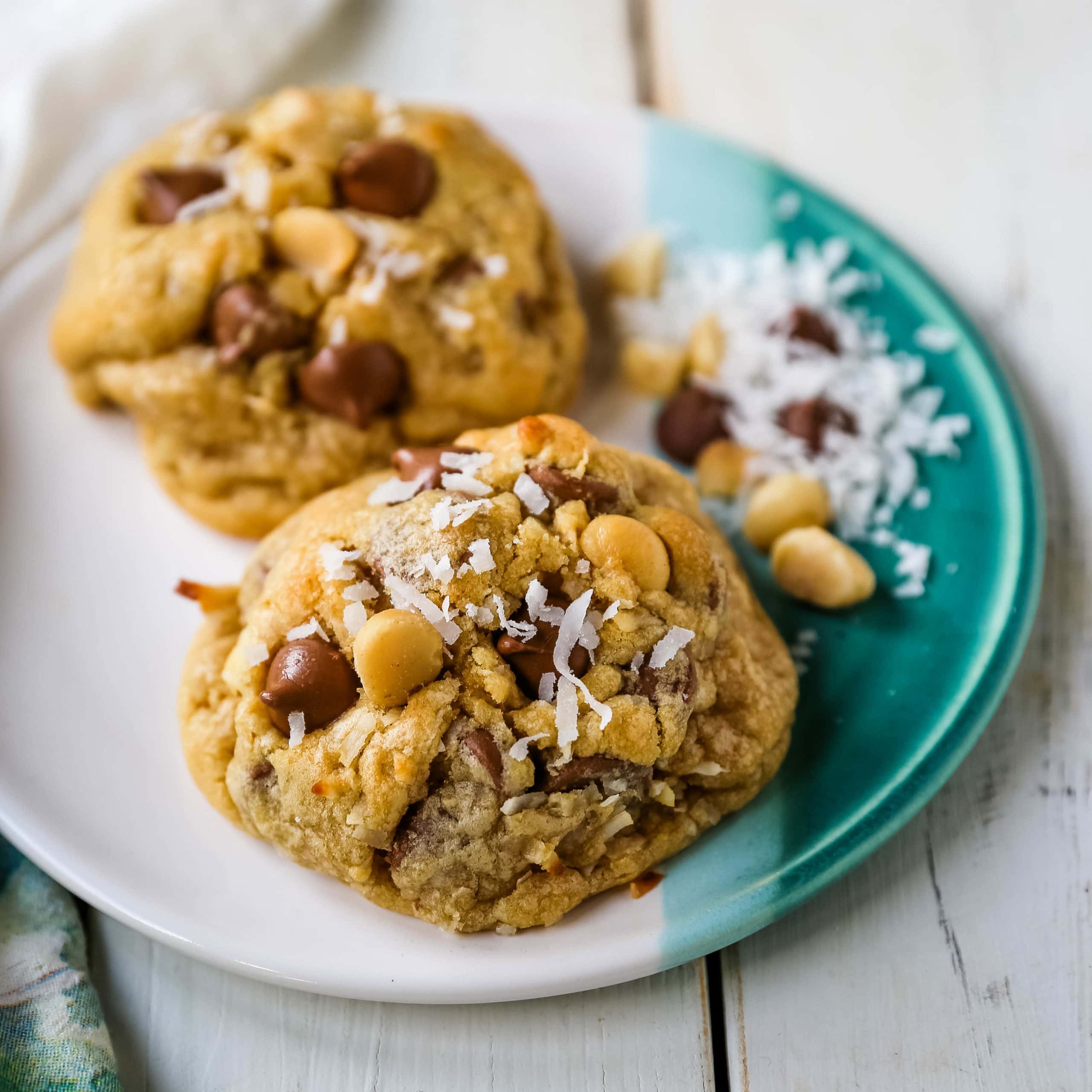 Milk Chocolate Chip Macadamia Nut Coconut Cookies Thick soft and chewy bakery-style milk chocolate chip macadamia nut coconut cookies are an Island favorite!  www.modernhoney.com #cookies #chocolatechipmacadamianut 