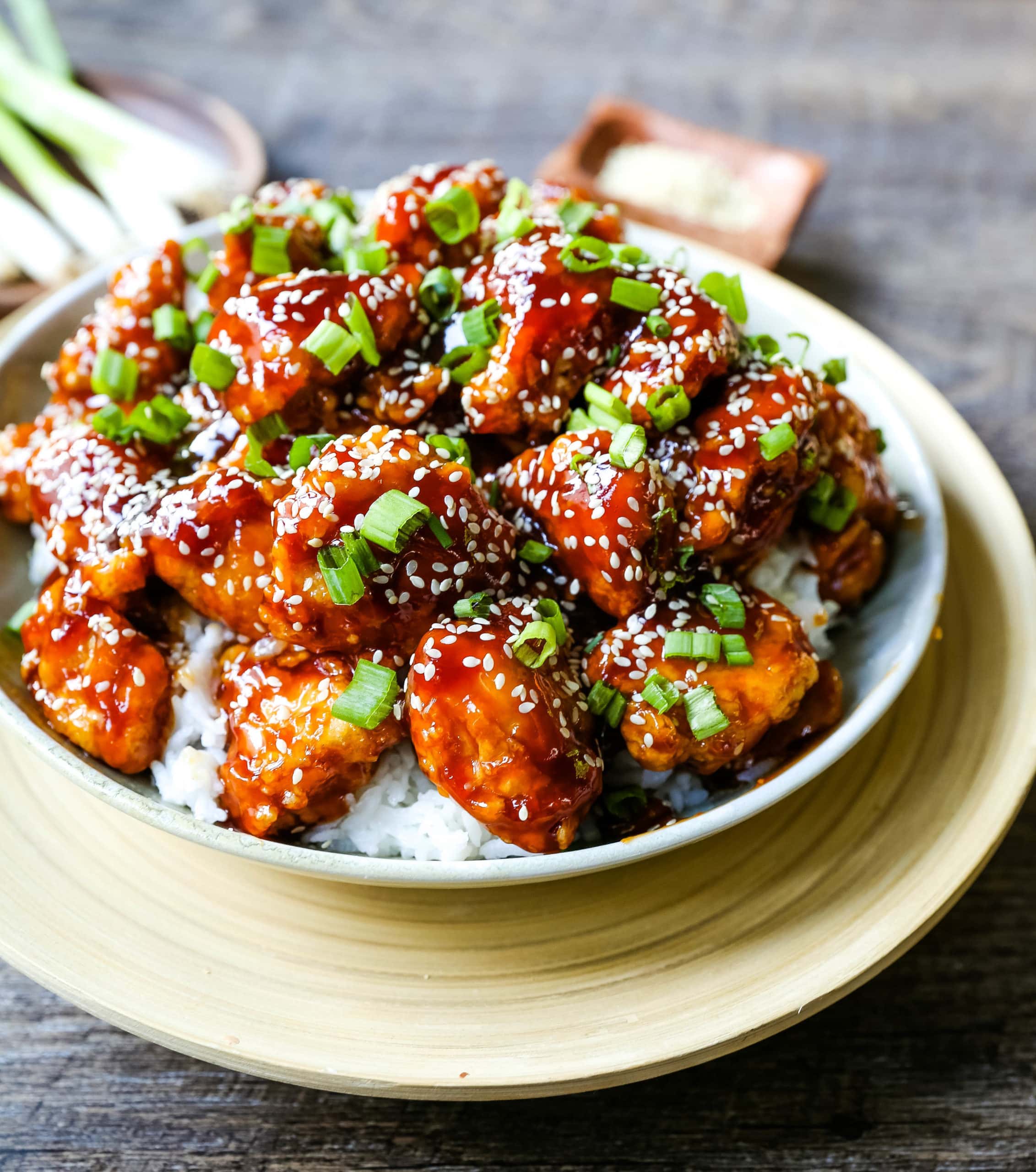 Sesame Chicken. Homemade Chinese Sesame Chicken made with crispy fried chicken covered in a sweet and sour sauce. The ultimate sesame chicken recipe is way better than take-out. www.modernhoney.com #sesamechicken #chinesefood 