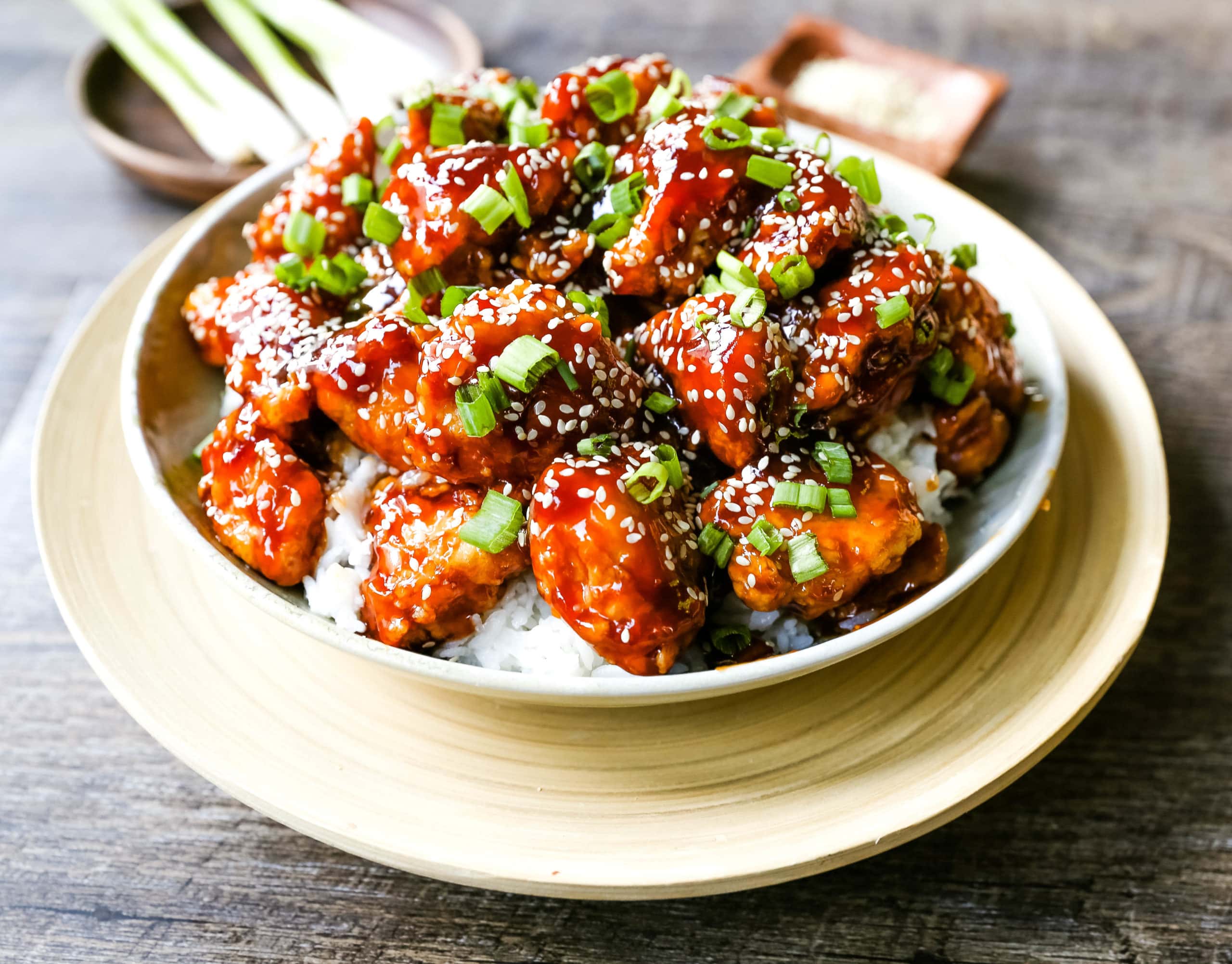 Sesame Chicken. Homemade Chinese Sesame Chicken made with crispy fried chicken covered in a sweet and sour sauce. The ultimate sesame chicken recipe is way better than take-out. www.modernhoney.com #sesamechicken #chinesefood 