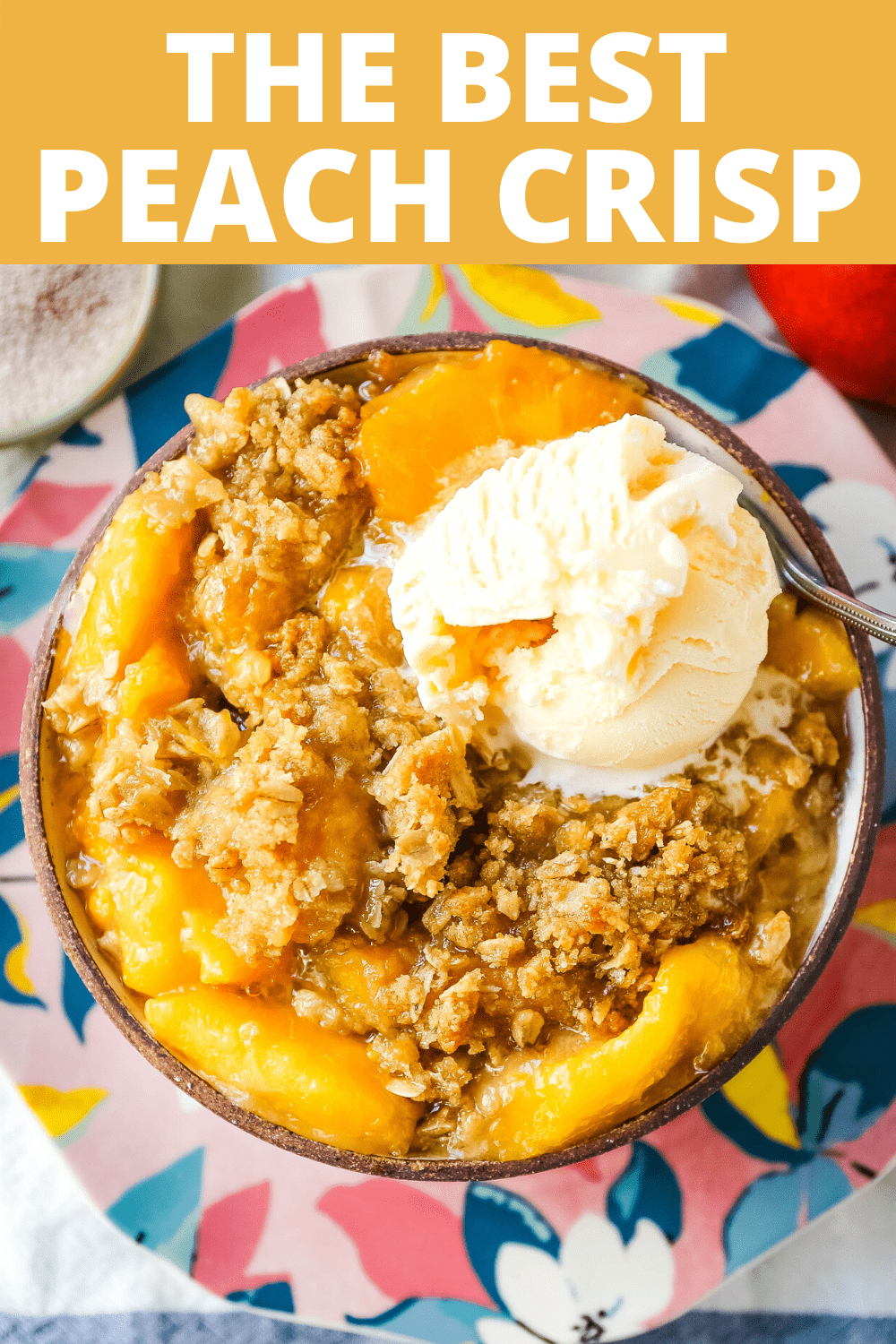 Peach Crisp. Fresh sweetened peaches with a brown sugar oat crumble topping with creamy vanilla ice cream. The perfect summer dessert! www.modernhoney.com #peach #peaches #peachcrisp #peachrecipes #peachdessert