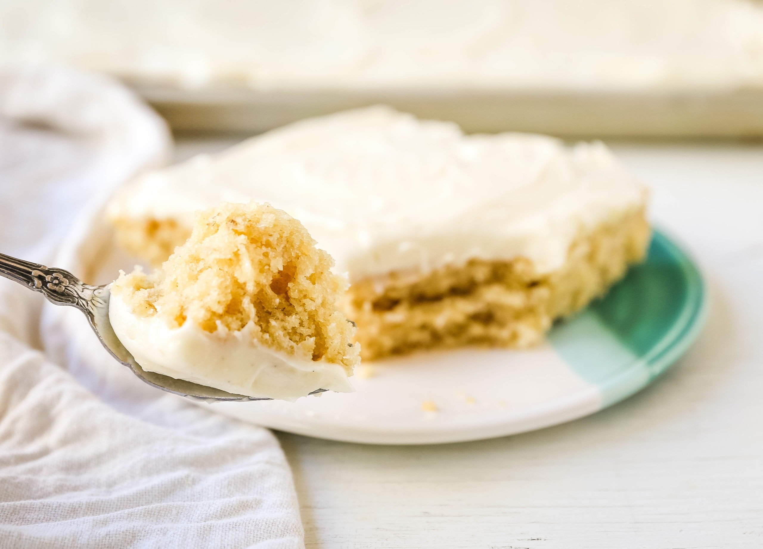 Banana Sheet Cake with Brown Butter Frosting Moist banana bars with a brown butter cream cheese buttercream. An easy frosted banana cake recipe! www.modernhoney.com #bananacake #bananabars #frostedbananacake #frostedbananabars #bananarecipes