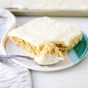 Banana Sheet Cake with Brown Butter Frosting Moist banana bars with a brown butter cream cheese buttercream. An easy frosted banana cake recipe! www.modernhoney.com #bananacake #bananabars #frostedbananacake #frostedbananabars #bananarecipes