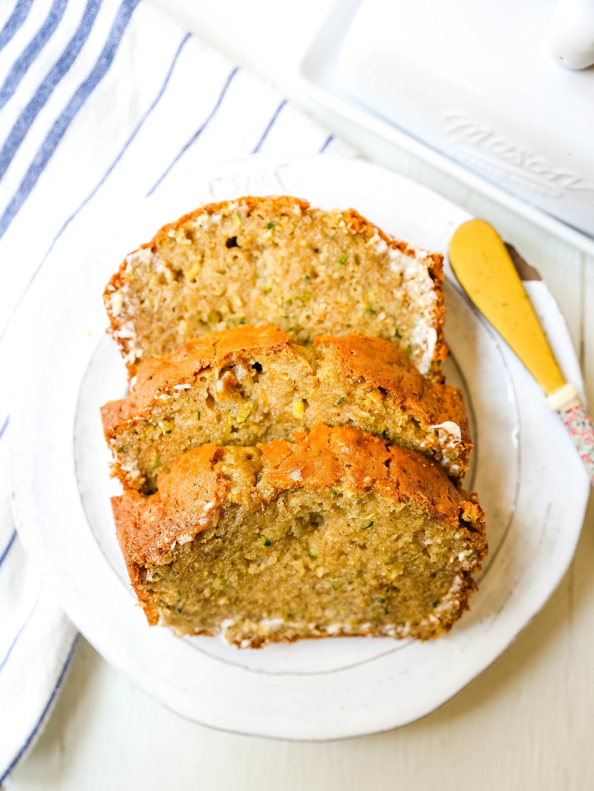 Zucchini Bread. This moist, sweet zucchini bread with a touch of spice is the best zucchini bread recipe out there!  www.modernhoney.com #zucchinibread #zucchini #quickbread #bread