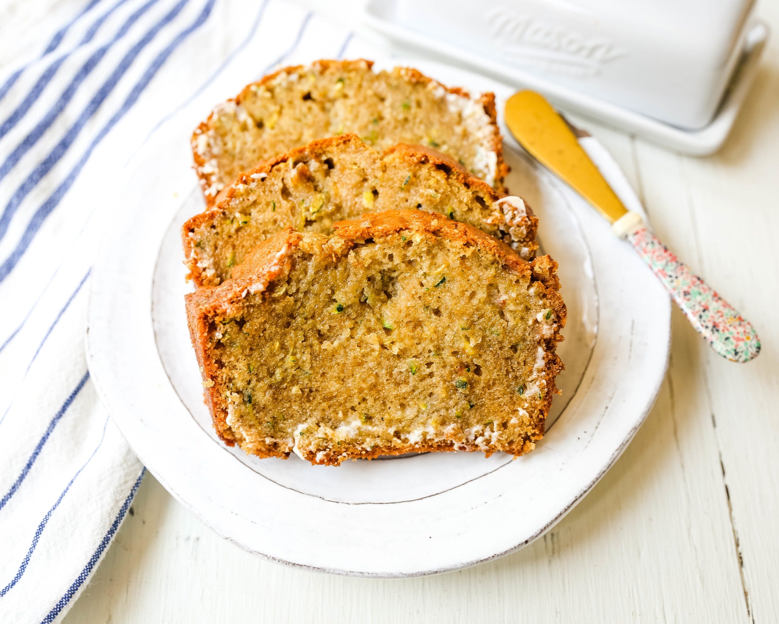 Zucchini Bread. This moist, sweet zucchini bread with a touch of spice is the best zucchini bread recipe out there!  www.modernhoney.com #zucchinibread #zucchini #quickbread #bread