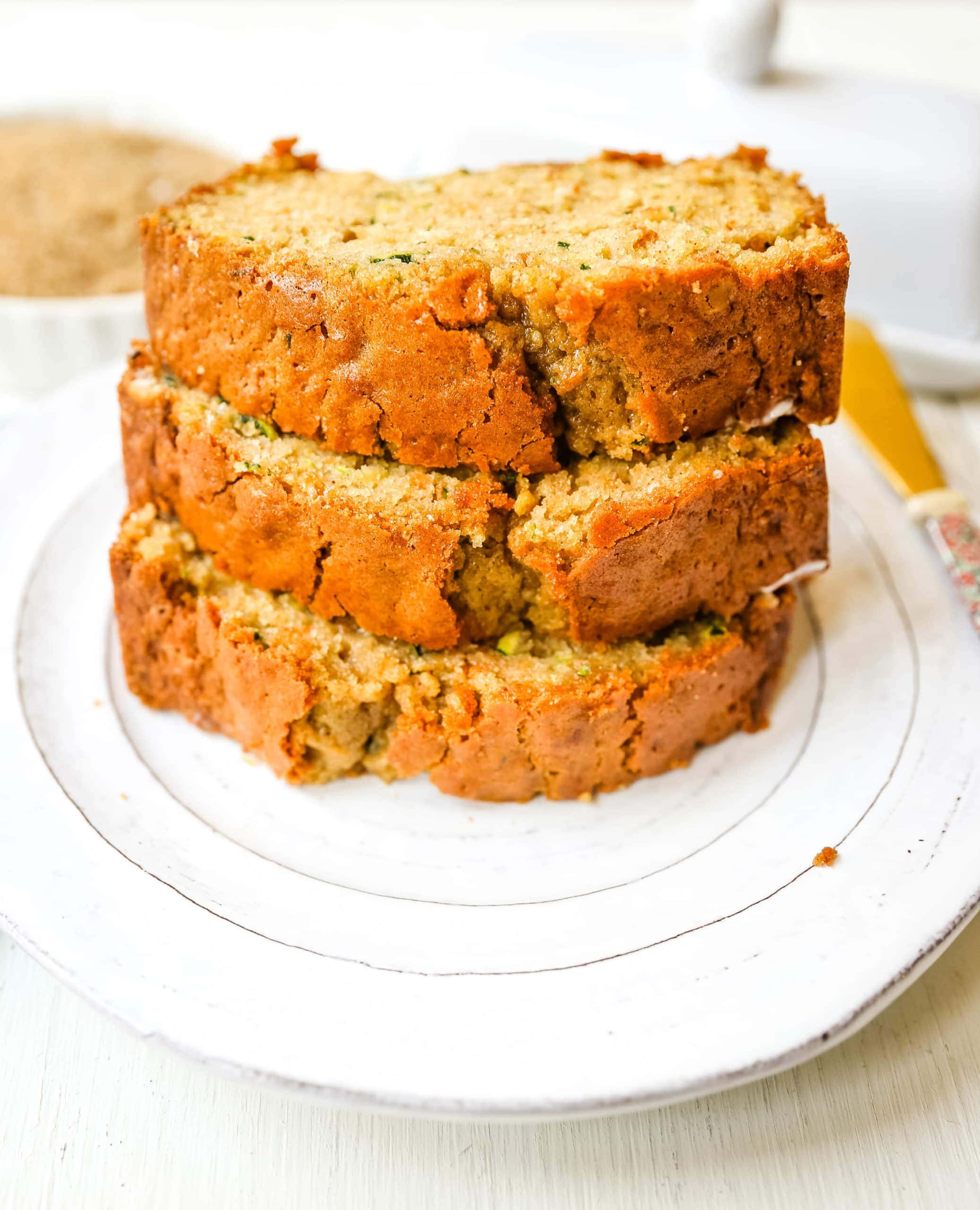 Zucchini Bread. This moist, sweet zucchini bread with a touch of spice is the best zucchini bread recipe out there!  www.modernhoney.com #zucchinibread #zucchini #quickbread #bread