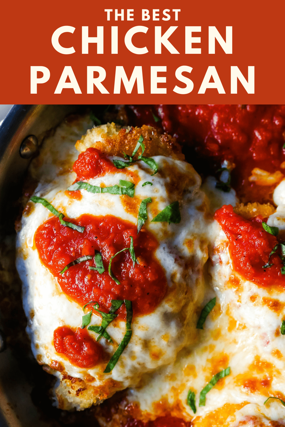 Chicken Parmesan. Panko-crusted chicken breast topped with homemade marinara sauce, melted whole milk mozzarella, and parmesan cheeses and baked until golden and bubbly. www.modernhoney.com #chicken #chickenparmesan #italian