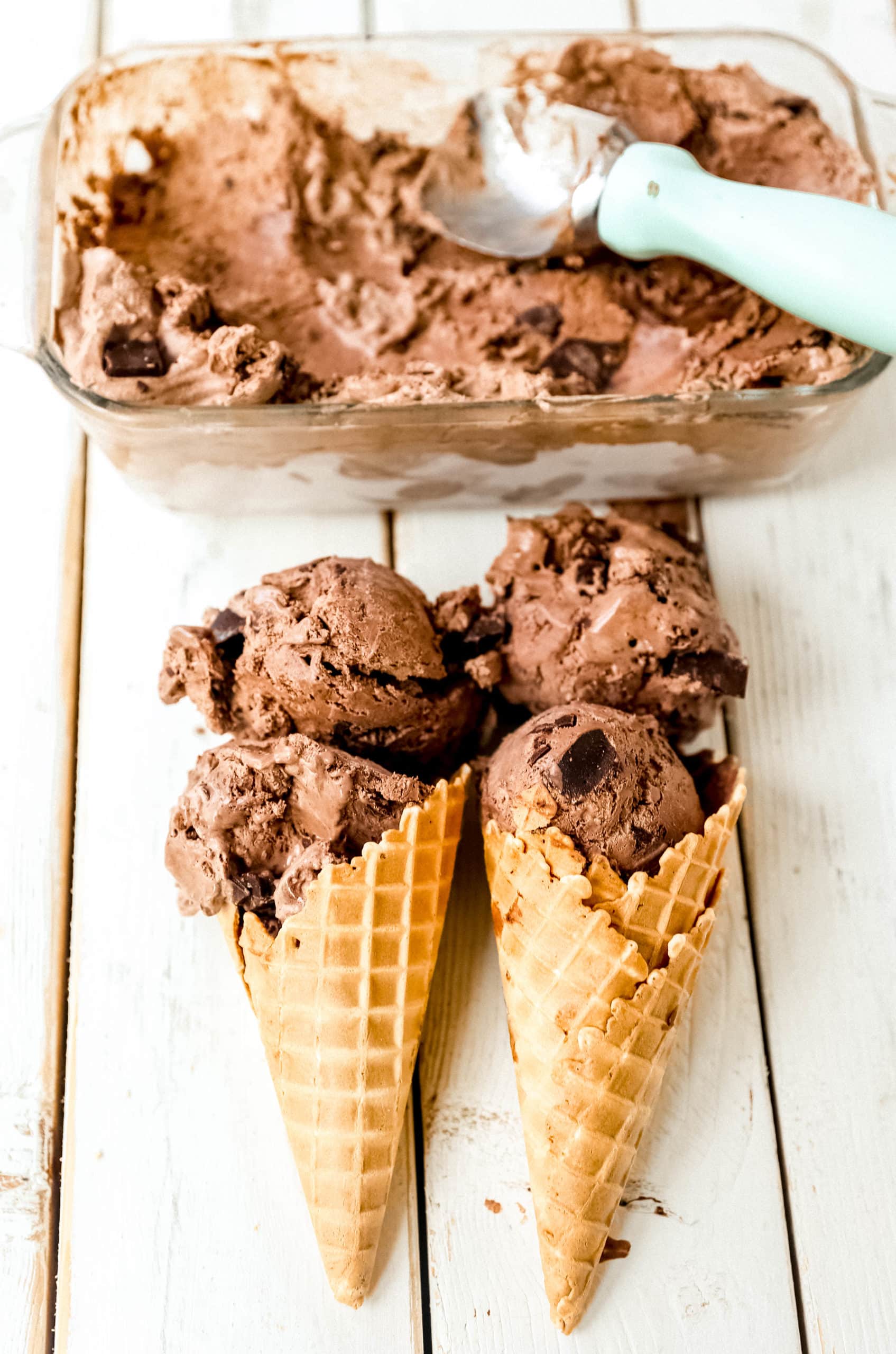 No-Churn Chocolate Chunk Ice Cream. How to make rich, creamy chocolate chunk ice cream at home without an ice cream maker! Homemade chocolate ice cream has never been easier! #icecream #nochurnicecream #chocolateicecream