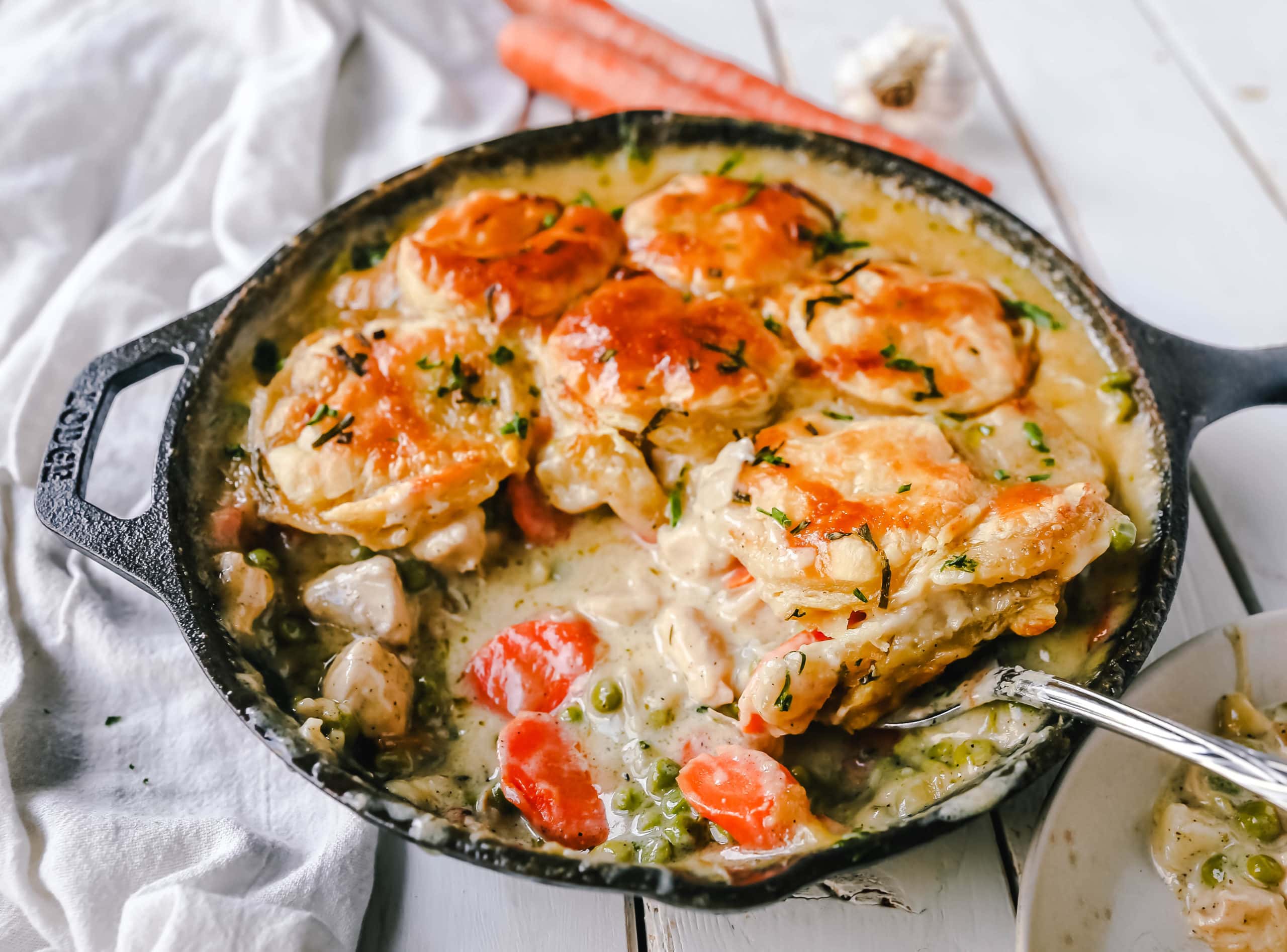 Skillet Chicken Pot Pie Easy, one-skillet chicken pot pie with vegetables baked in a cream sauce and topped with buttery puff pastry. A quick and easy chicken pot pie recipe! www.modernhoney.com #chickenpotpie #potpie #chicken 