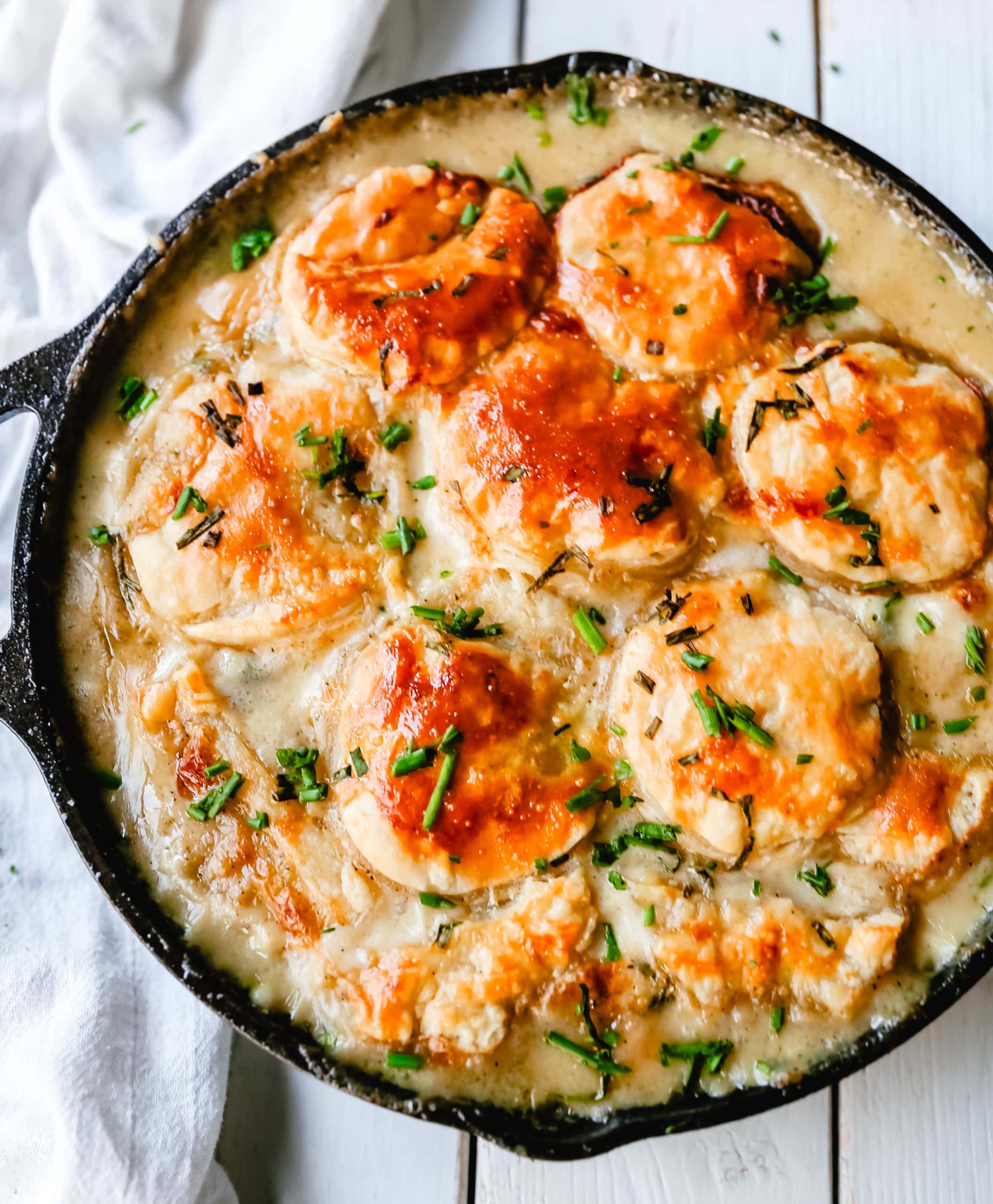 Skillet Chicken Pot Pie Easy, one-skillet chicken pot pie with vegetables baked in a cream sauce and topped with buttery puff pastry. A quick and easy chicken pot pie recipe! www.modernhoney.com #chickenpotpie #potpie #chicken 