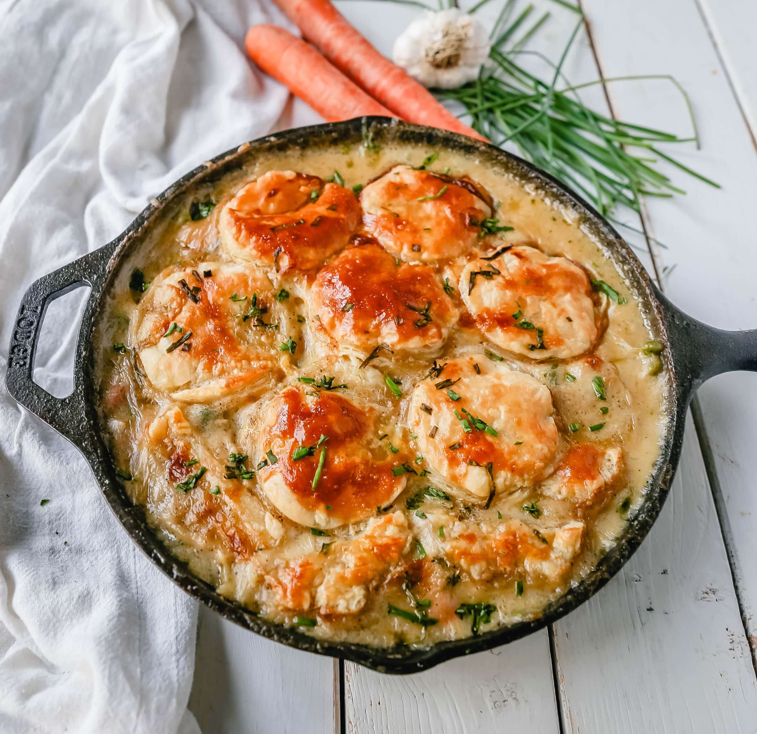 Skillet Chicken Pot Pie Easy, one-skillet chicken pot pie with vegetables baked in a cream sauce and topped with buttery puff pastry. A quick and easy chicken pot pie recipe! www.modernhoney.com #chickenpotpie #potpie #chicken 