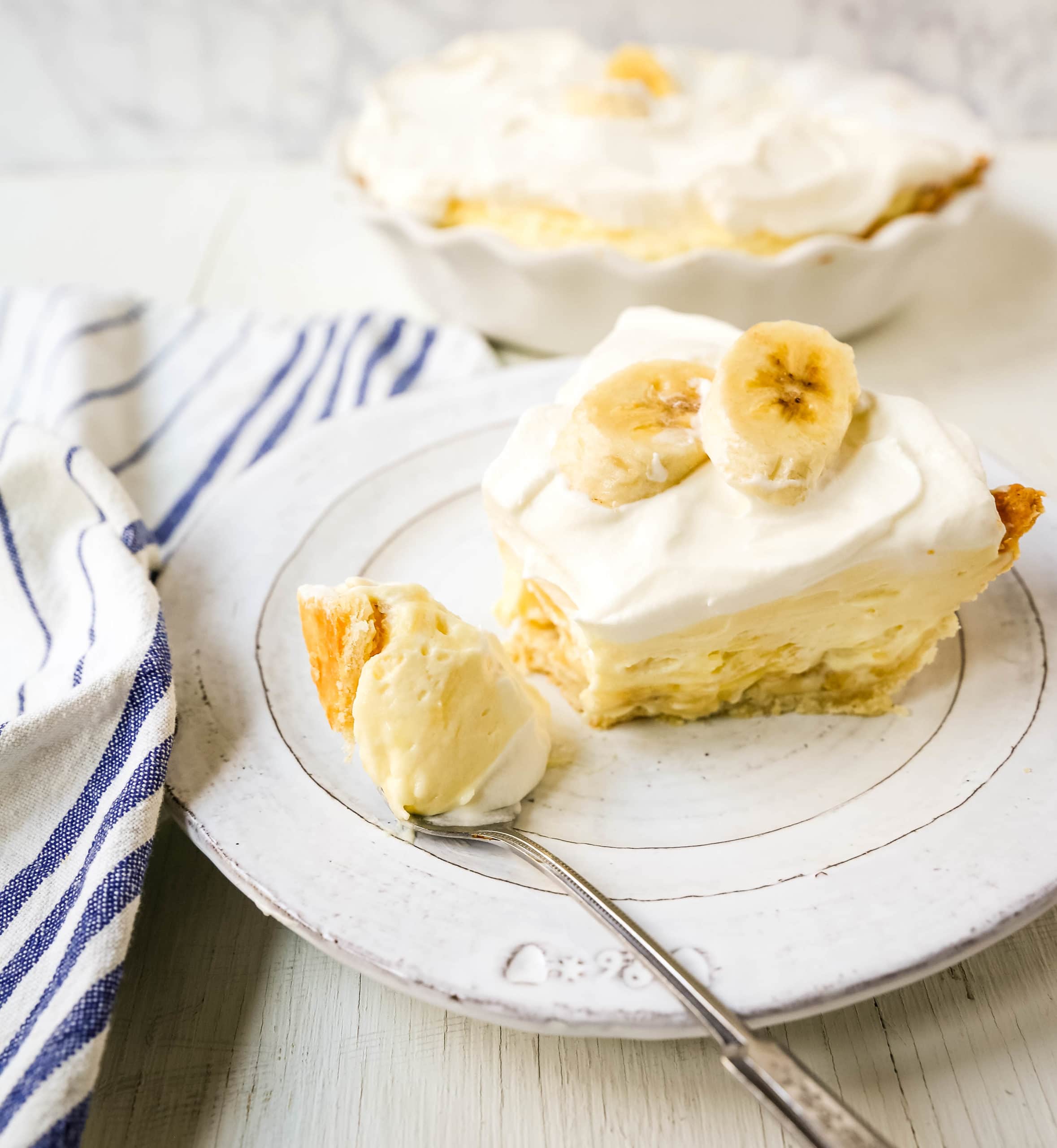 Banana Cream Pie Homemade banana cream pie made with a creamy sweet vanilla filling with fresh bananas, handcrafted whipped cream, all in a buttery pie crust. www.modernhoney.com #pie #bananacreampie #thanksgiving