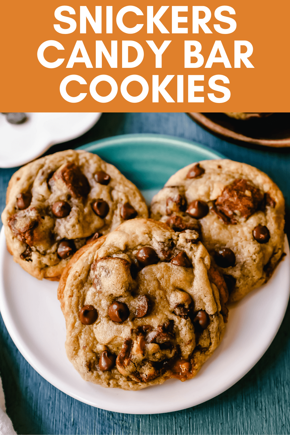 Snickers Chocolate Chip Cookies Soft, chewy chocolate chip cookies with Snickers candy bars baked in them. The perfect chocolate chip Snickers caramel bar cookies! 