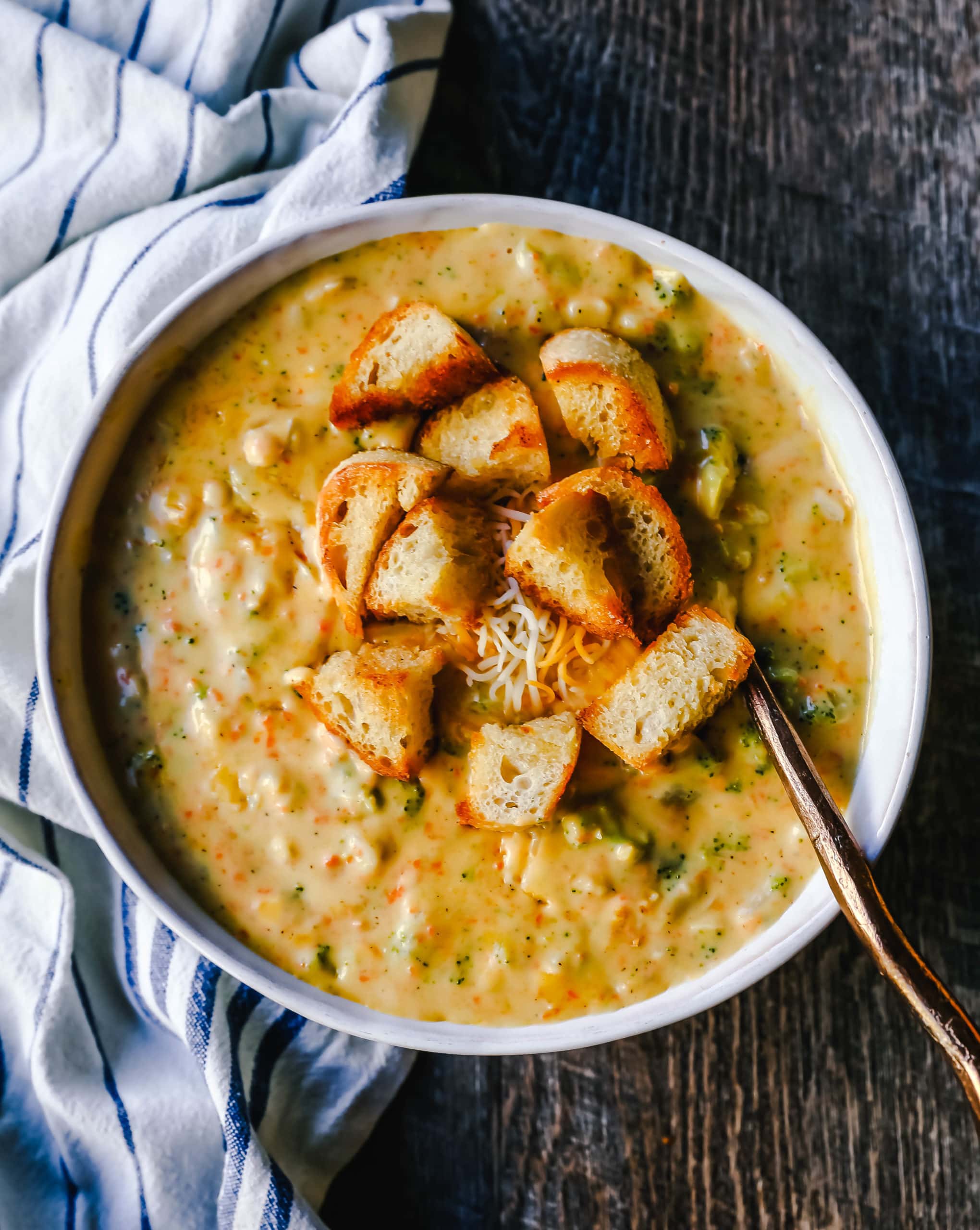 Broccoli Cheddar Soup Creamy Broccoli Cheddar Soup made with fresh broccoli, cream, and sharp cheddar cheese. The best Broccoli Cheese Soup! #soup #broccoli #broccolicheddarsoup