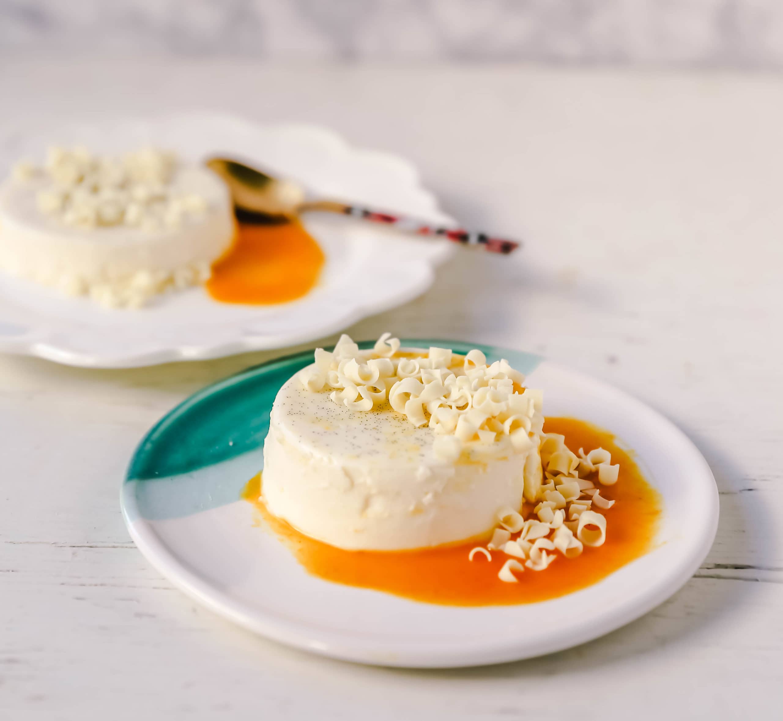 Panna Cotta. A silky smooth, creamy vanilla bean dessert made with cream, sugar, gelatin, and vanilla beans. An Italian favorite dessert! www.modernhoney.com #pannacotta #dessert #pannacottadessert