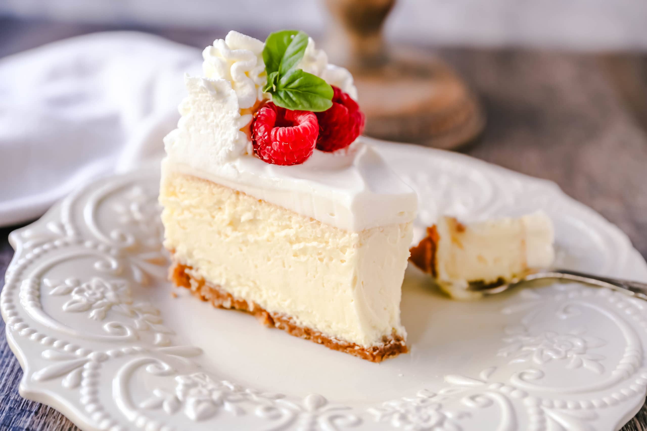 The Best Cheesecake Recipe How to make the creamiest, dreamiest, richest vanilla cheesecake with a buttery graham cracker crust. All of the tips and tricks for making the perfect cheesecake! www.modernhoney.com #cheesecake #vanillacheesecake #cheesecakerecipe #dessert