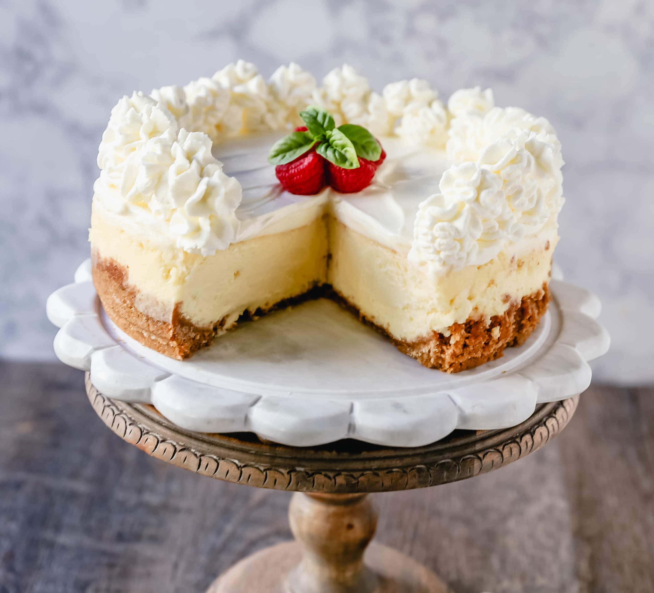 The Best Cheesecake Recipe How to make the creamiest, dreamiest, richest vanilla cheesecake with a buttery graham cracker crust. All of the tips and tricks for making the perfect cheesecake! www.modernhoney.com #cheesecake #vanillacheesecake #cheesecakerecipe #dessert