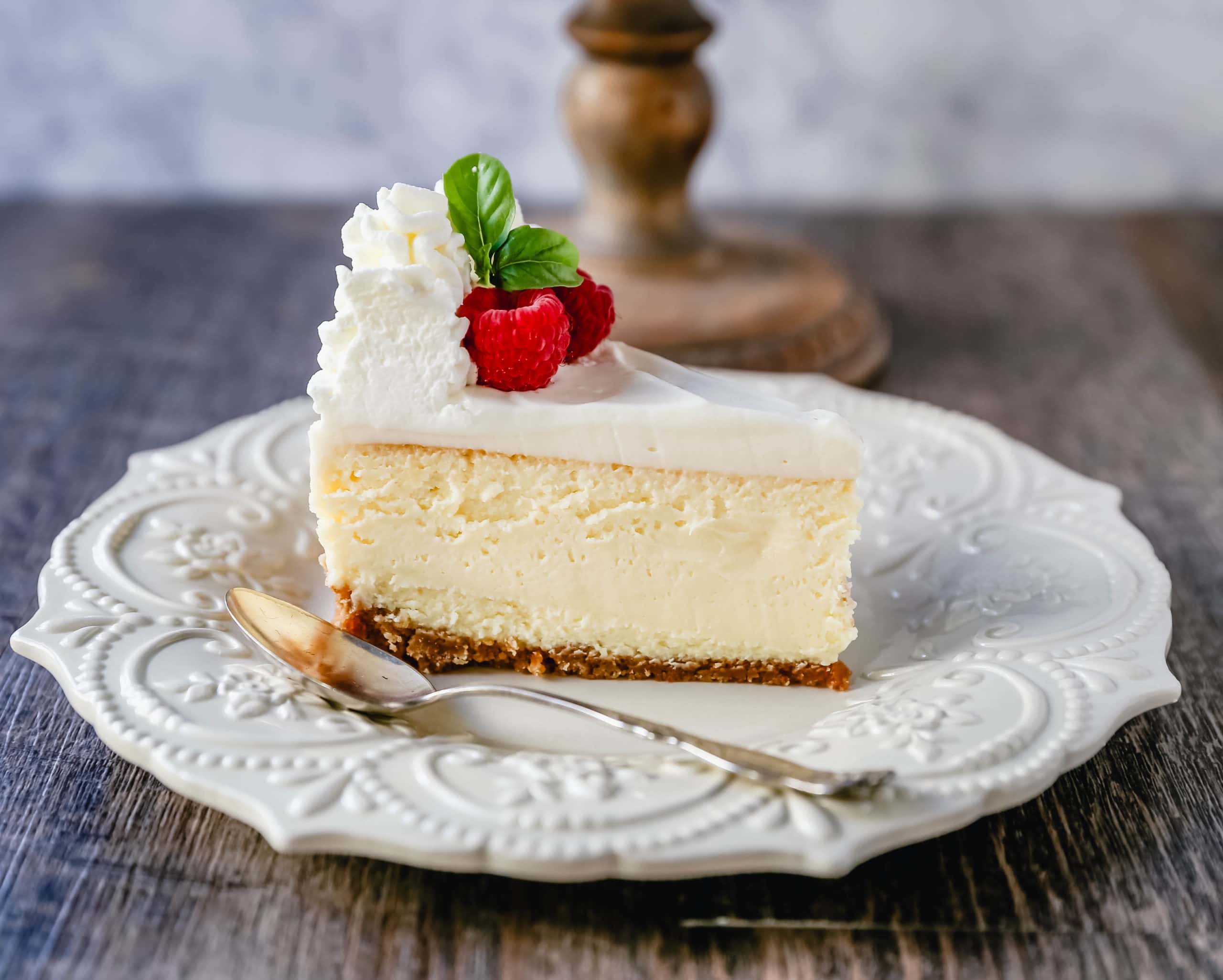 The Best Cheesecake Recipe How to make the creamiest, dreamiest, richest vanilla cheesecake with a buttery graham cracker crust. All of the tips and tricks for making the perfect cheesecake! www.modernhoney.com #cheesecake #vanillacheesecake #cheesecakerecipe #dessert