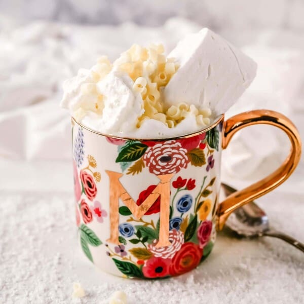 Homemade White Hot Chocolate Creamy, silky-smooth white chocolate made with white chocolate, whole milk, and vanilla beans. Topped with fresh whipped cream, homemade soft marshmallows, and white chocolate shavings. www.modernhoney.com #whitechocolate #hotwhitechocolate #whitehotchocolate