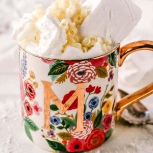 Homemade White Hot Chocolate Creamy, silky-smooth white chocolate made with white chocolate, whole milk, and vanilla beans. Topped with fresh whipped cream, homemade soft marshmallows, and white chocolate shavings. www.modernhoney.com #whitechocolate #hotwhitechocolate #whitehotchocolate