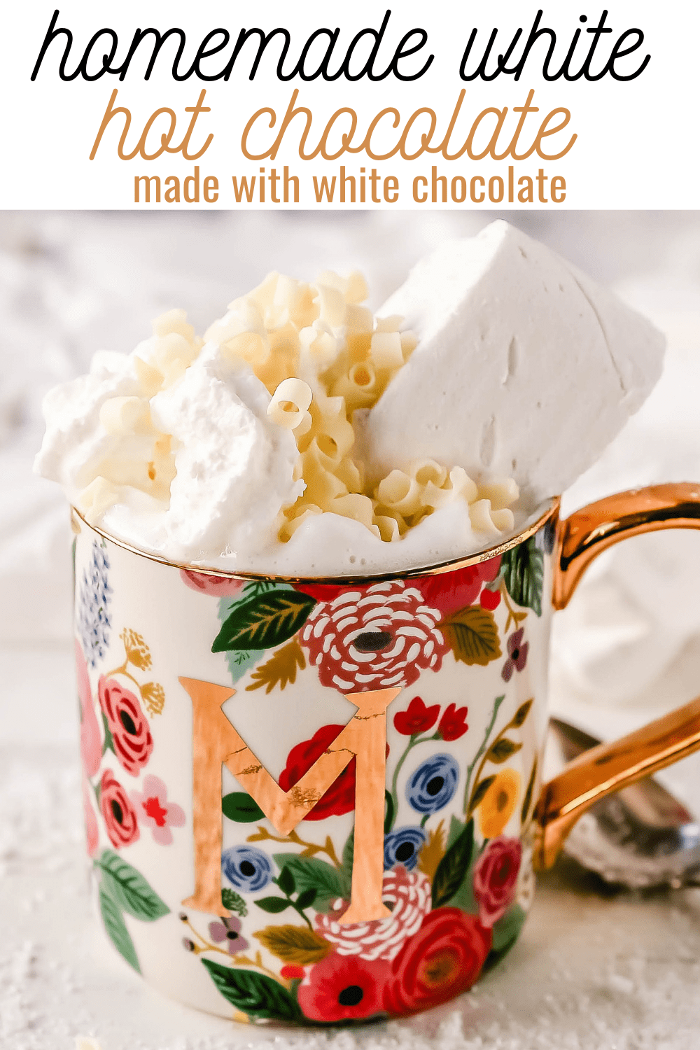 Homemade White Hot Chocolate Creamy, silky-smooth white chocolate made with white chocolate, whole milk, and vanilla beans. Topped with fresh whipped cream, homemade soft marshmallows, and white chocolate shavings. www.modernhoney.com #whitechocolate #hotwhitechocolate #whitehotchocolate