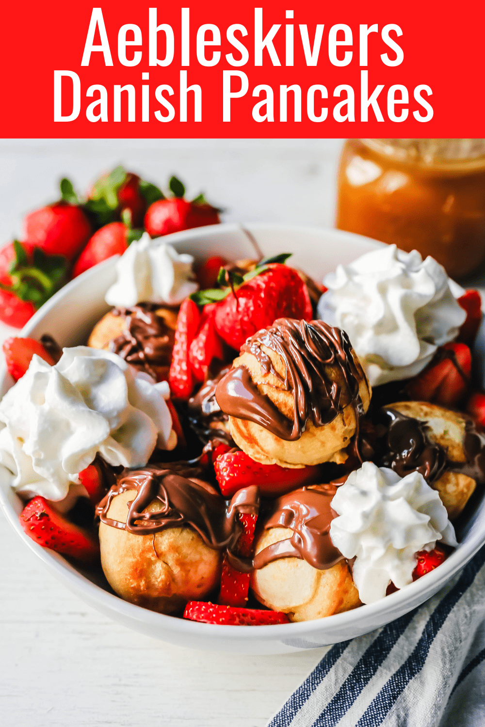 Aebleskiver Danish Pancakes a traditional Danish breakfast or dessert popular in Denmark is a circle pancake cooked in an aebleskiver pan and served with jam, powdered sugar, syrup, and fruit.  www.modernhoney.com #aebleskivers #danishpancakes #pancakes